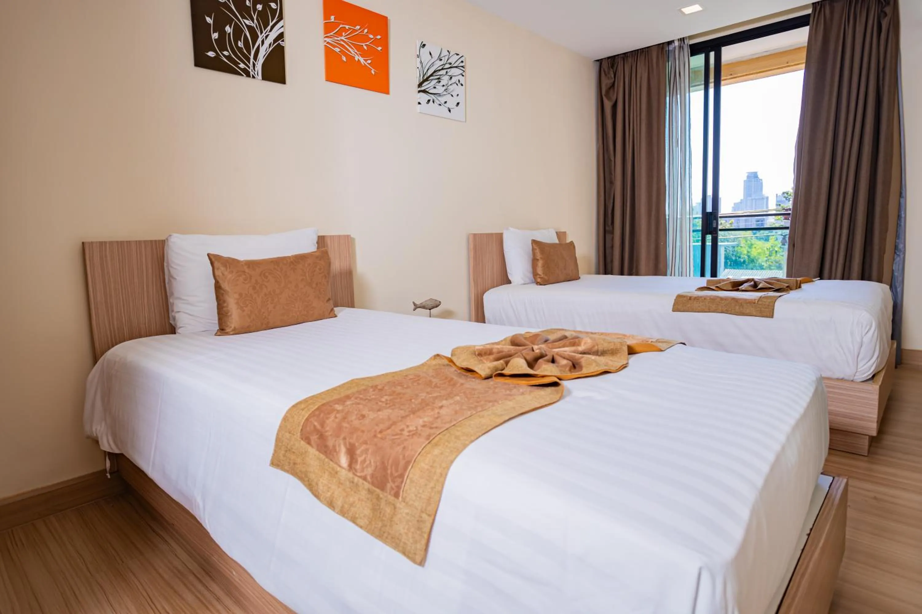 Bed in Ramada by Wyndham Bangkok Ten Ekamai Residences