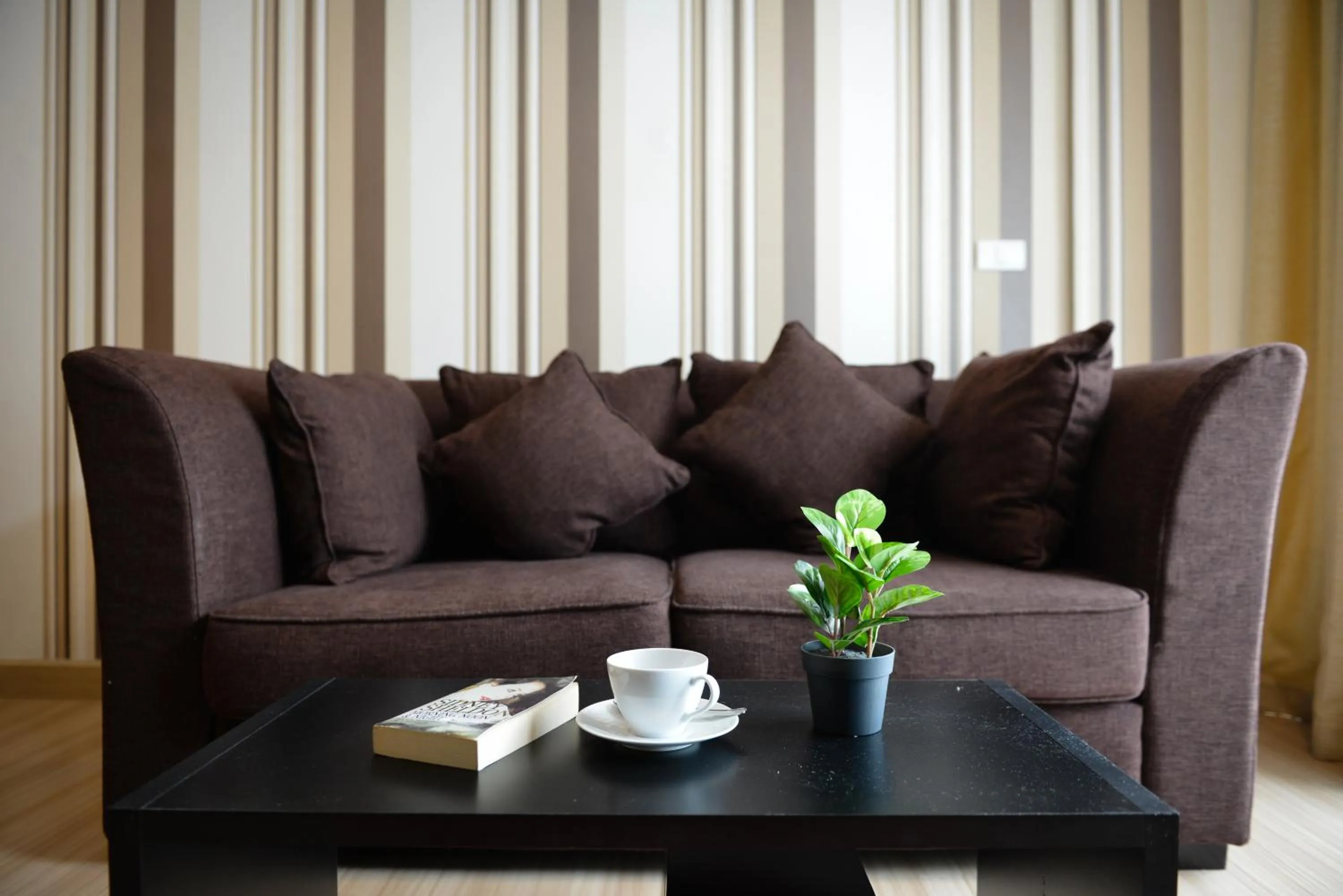 Living room in Ramada by Wyndham Bangkok Ten Ekamai Residences