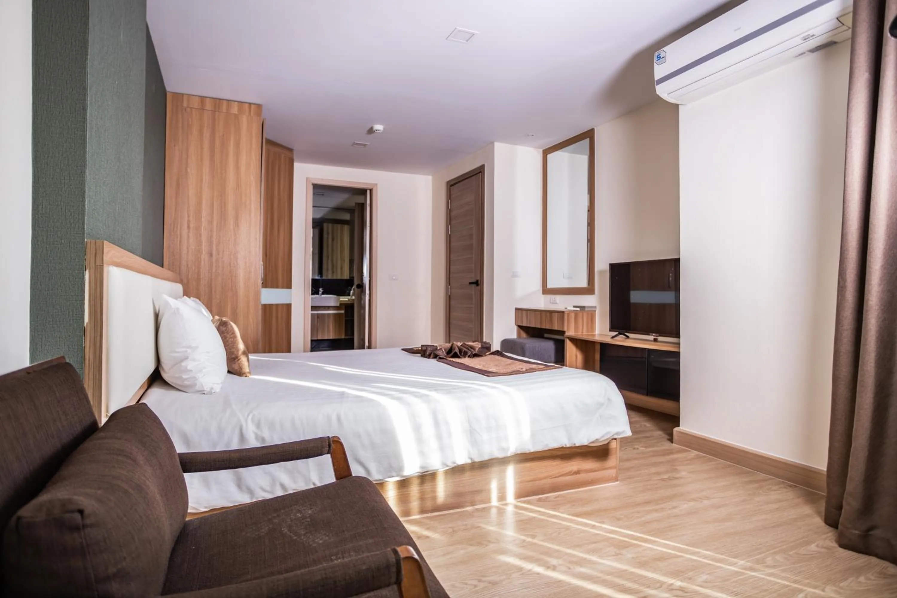 Bed in Ramada by Wyndham Bangkok Ten Ekamai Residences