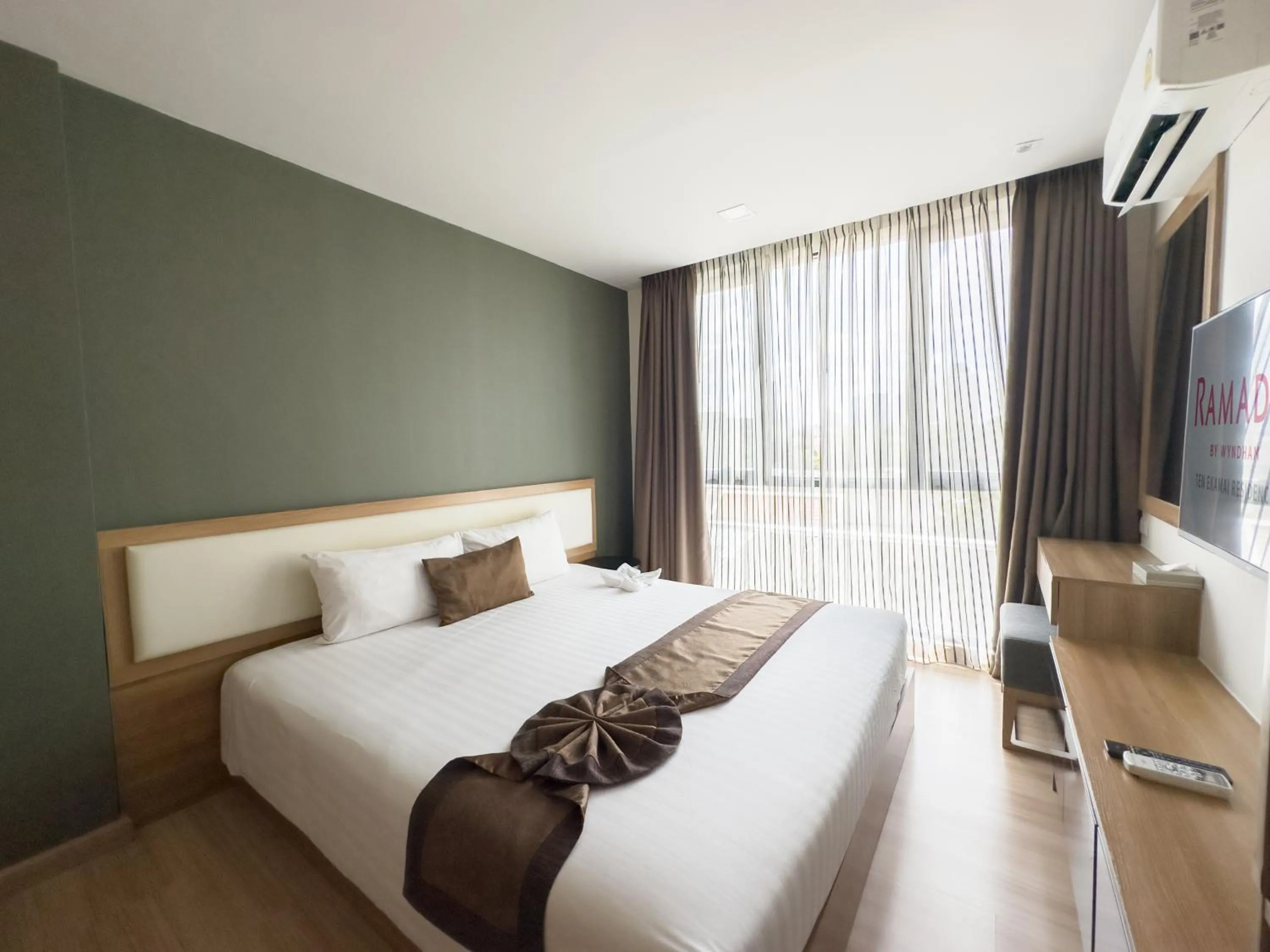 Bedroom, Bed in Ramada by Wyndham Bangkok Ten Ekamai Residences