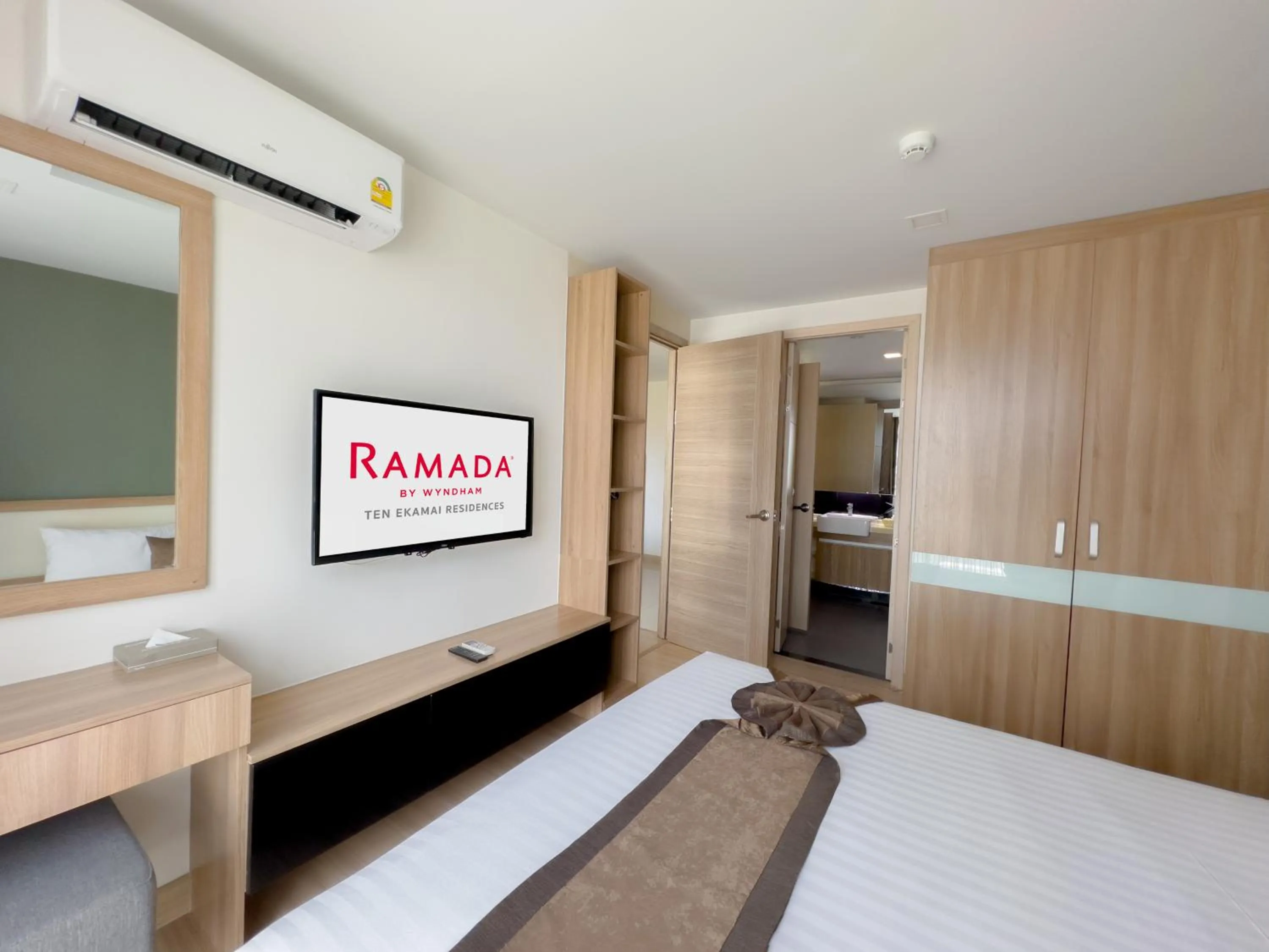 Bedroom, Bed in Ramada by Wyndham Bangkok Ten Ekamai Residences