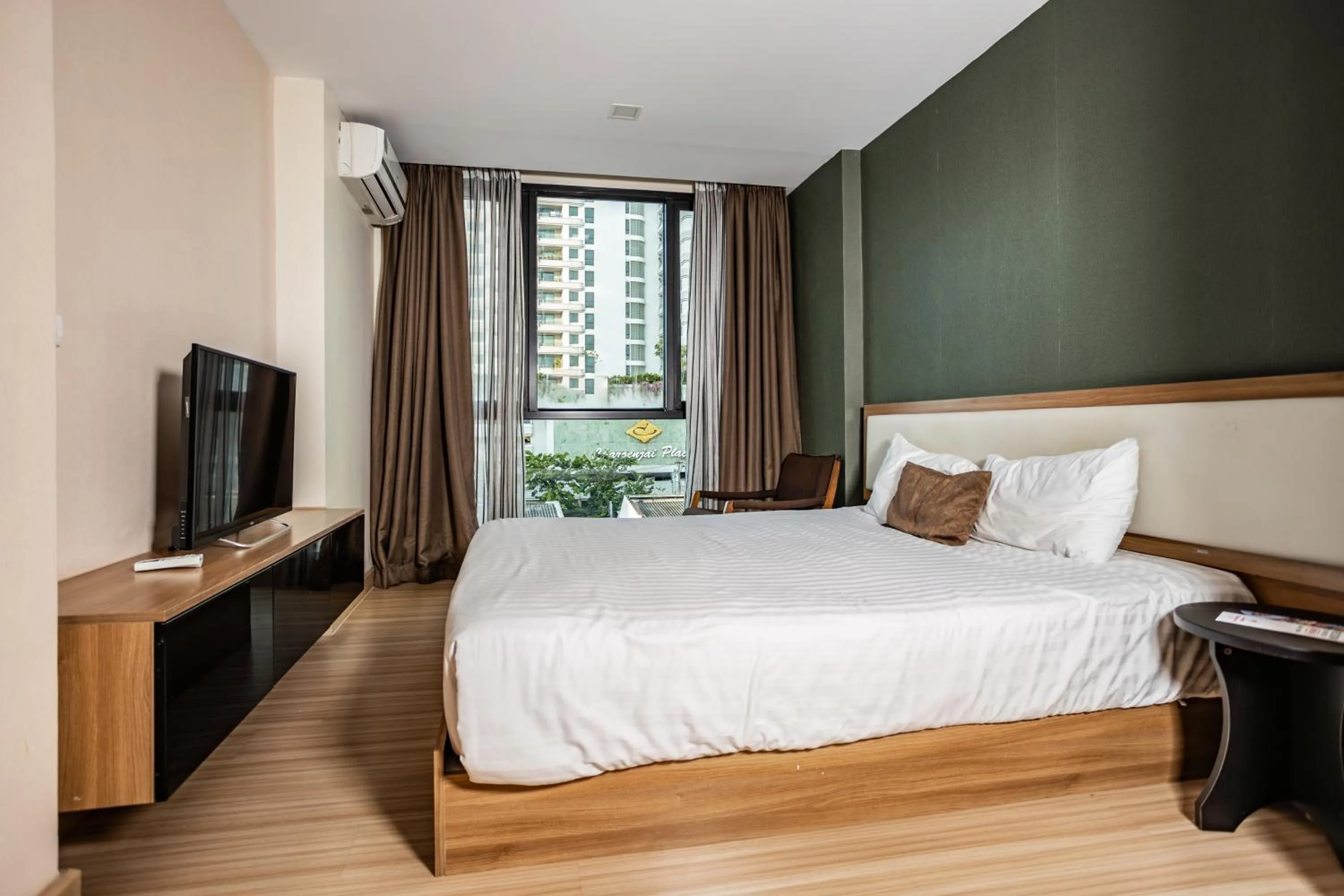 Bed in Ramada by Wyndham Bangkok Ten Ekamai Residences