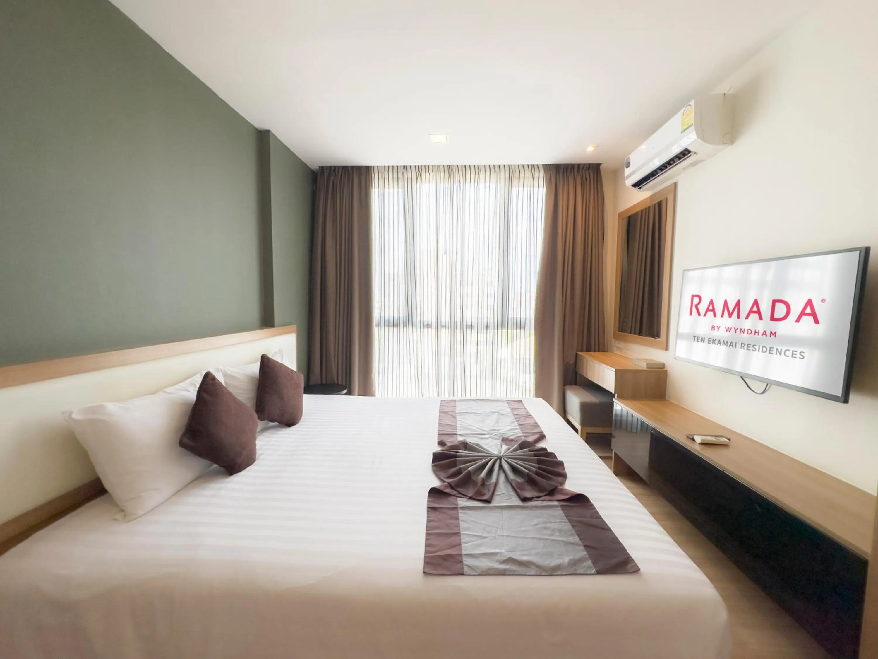 Bedroom, Bed in Ramada by Wyndham Bangkok Ten Ekamai Residences