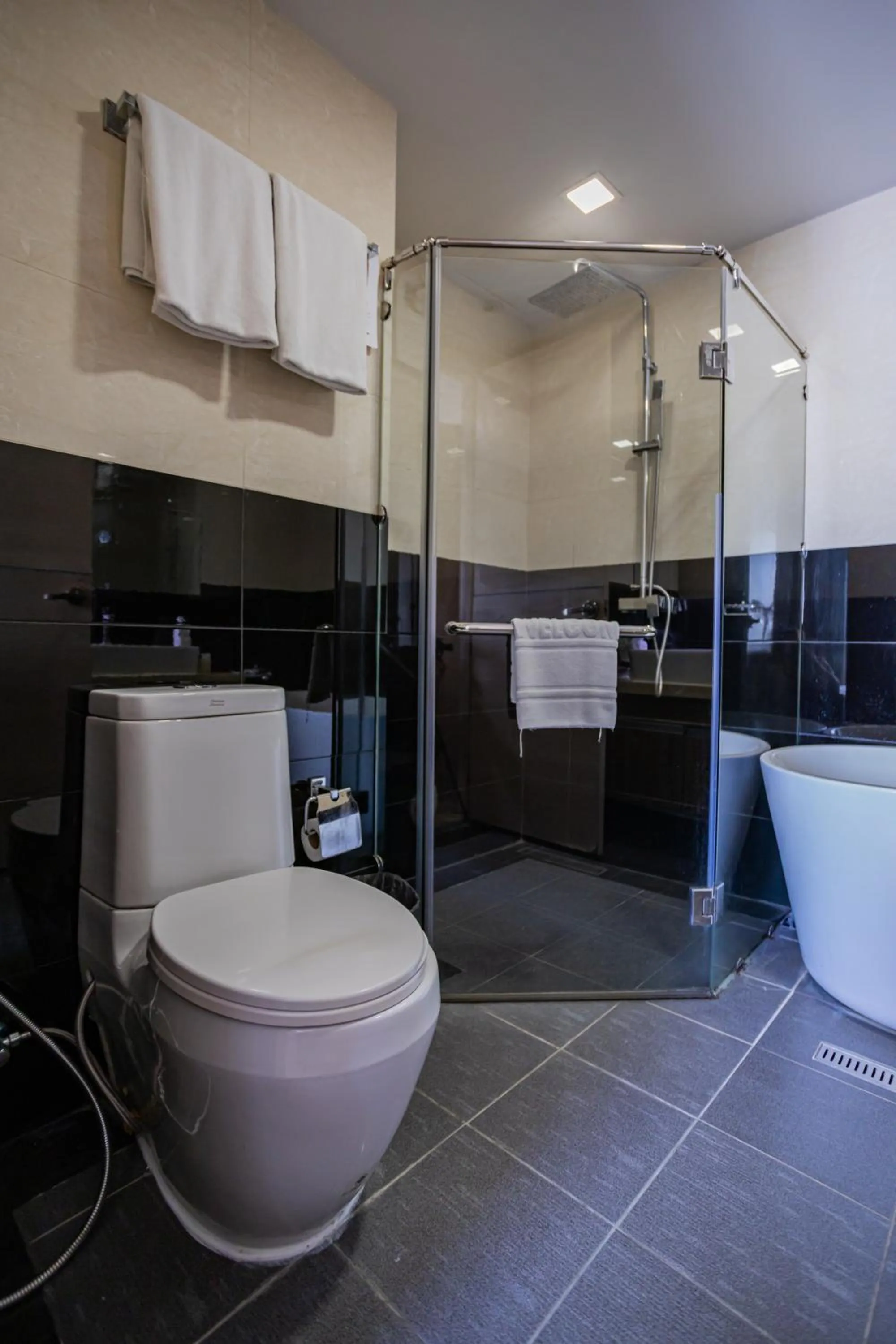 Shower in Ramada by Wyndham Bangkok Ten Ekamai Residences