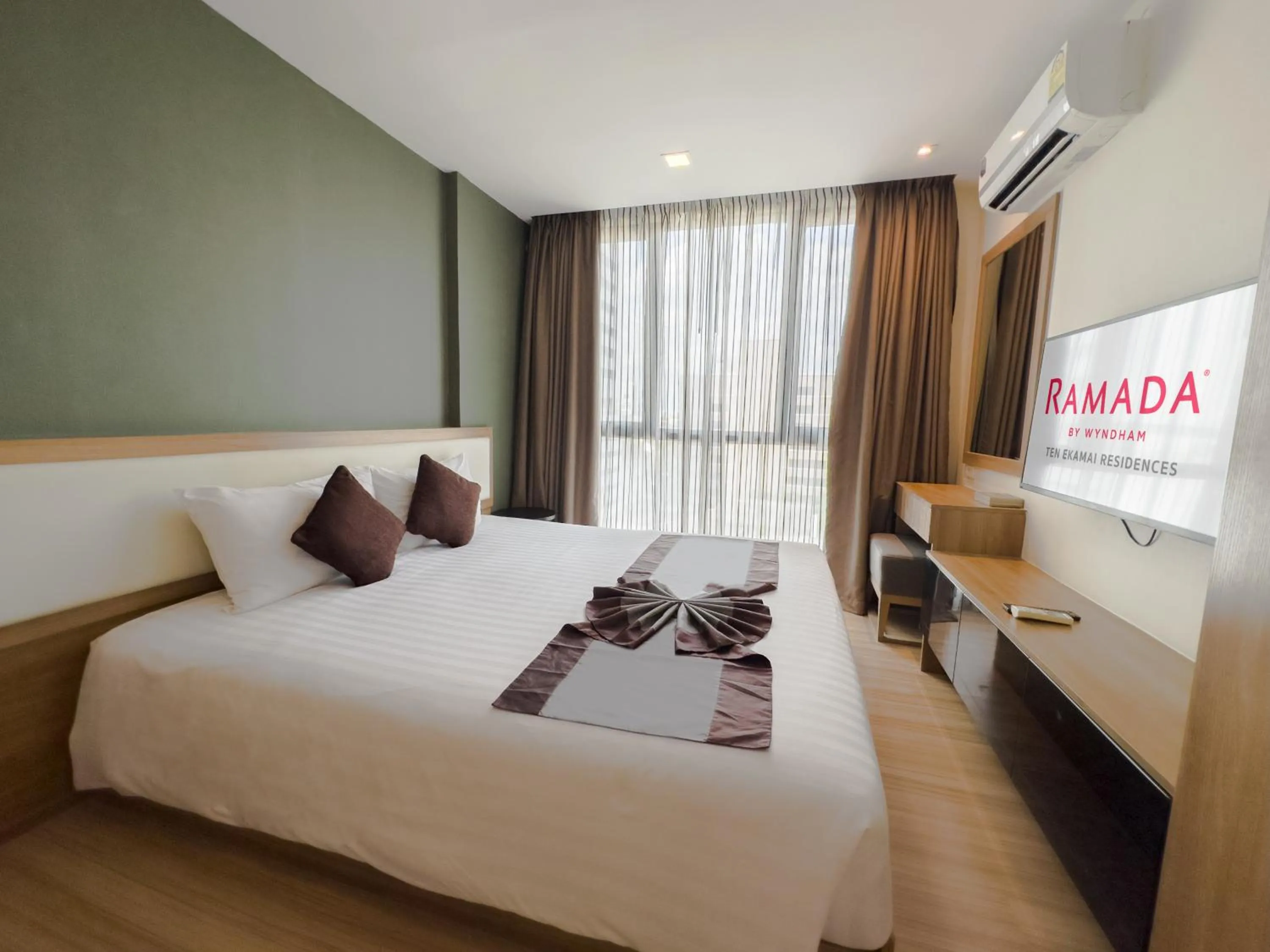 Bedroom, Bed in Ramada by Wyndham Bangkok Ten Ekamai Residences