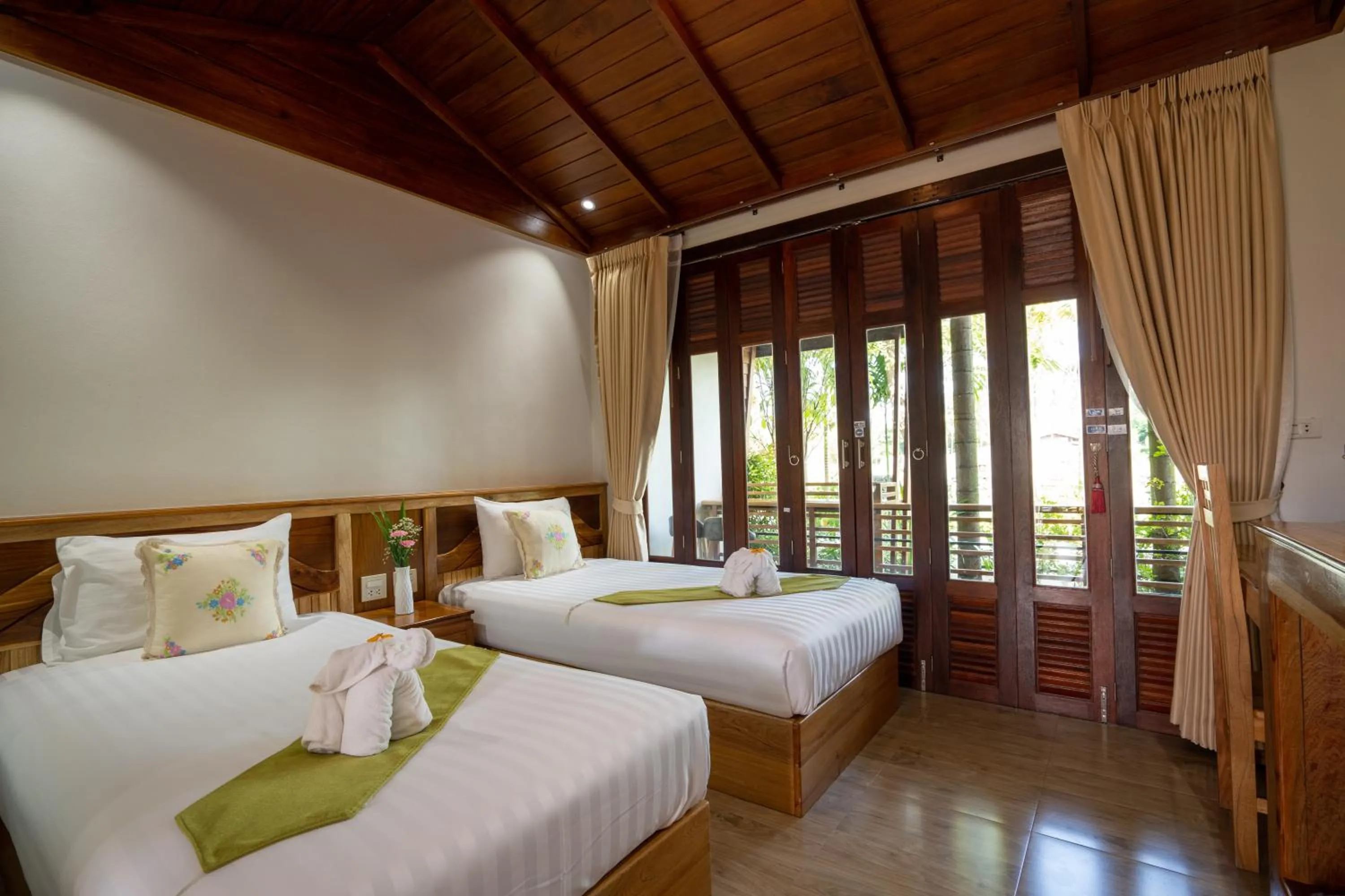 Bed in Merry Spa & Resort
