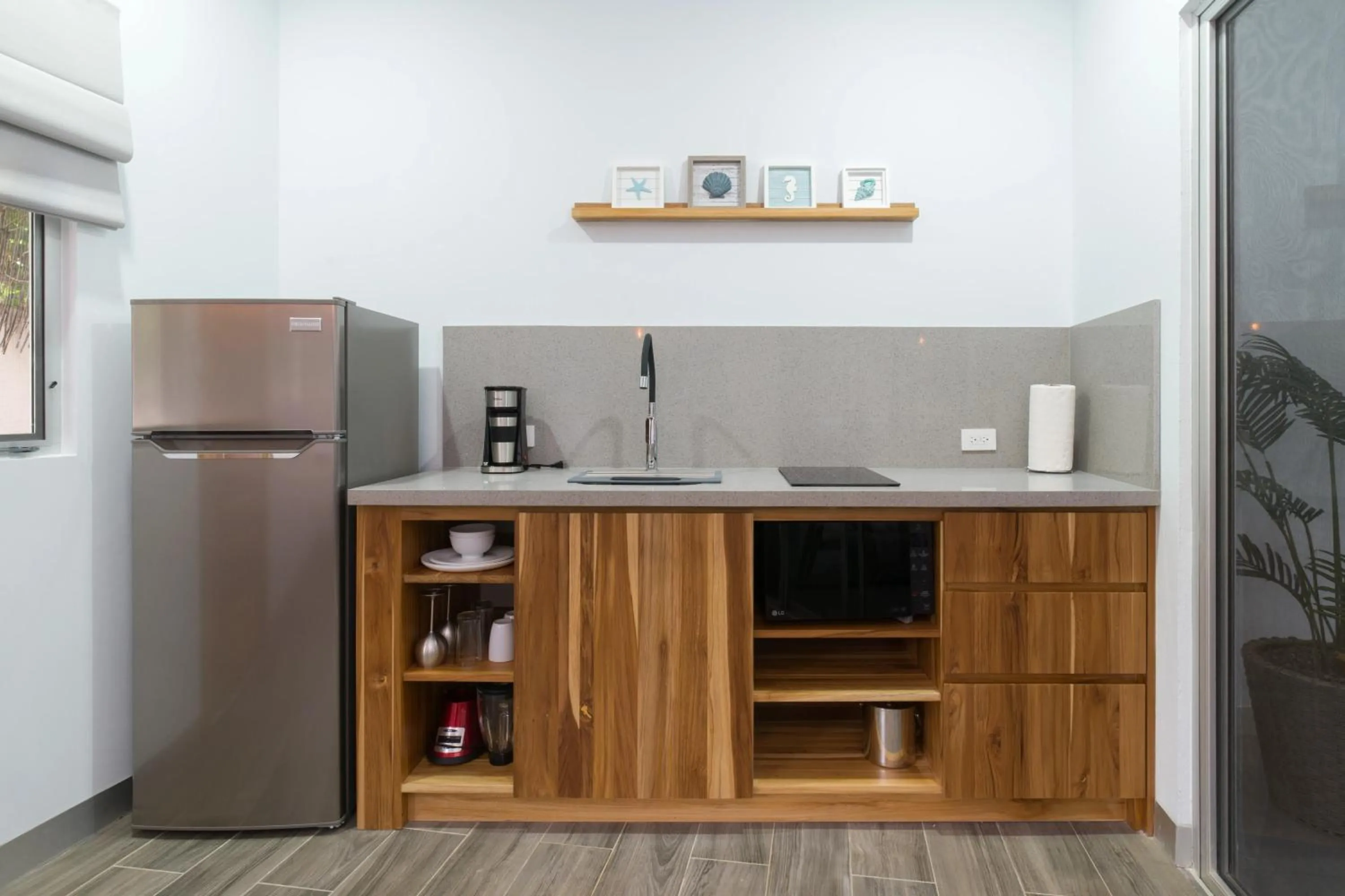 Kitchen or kitchenette in Tamarindo Bay Boutique Hotel, Apartments & Suites