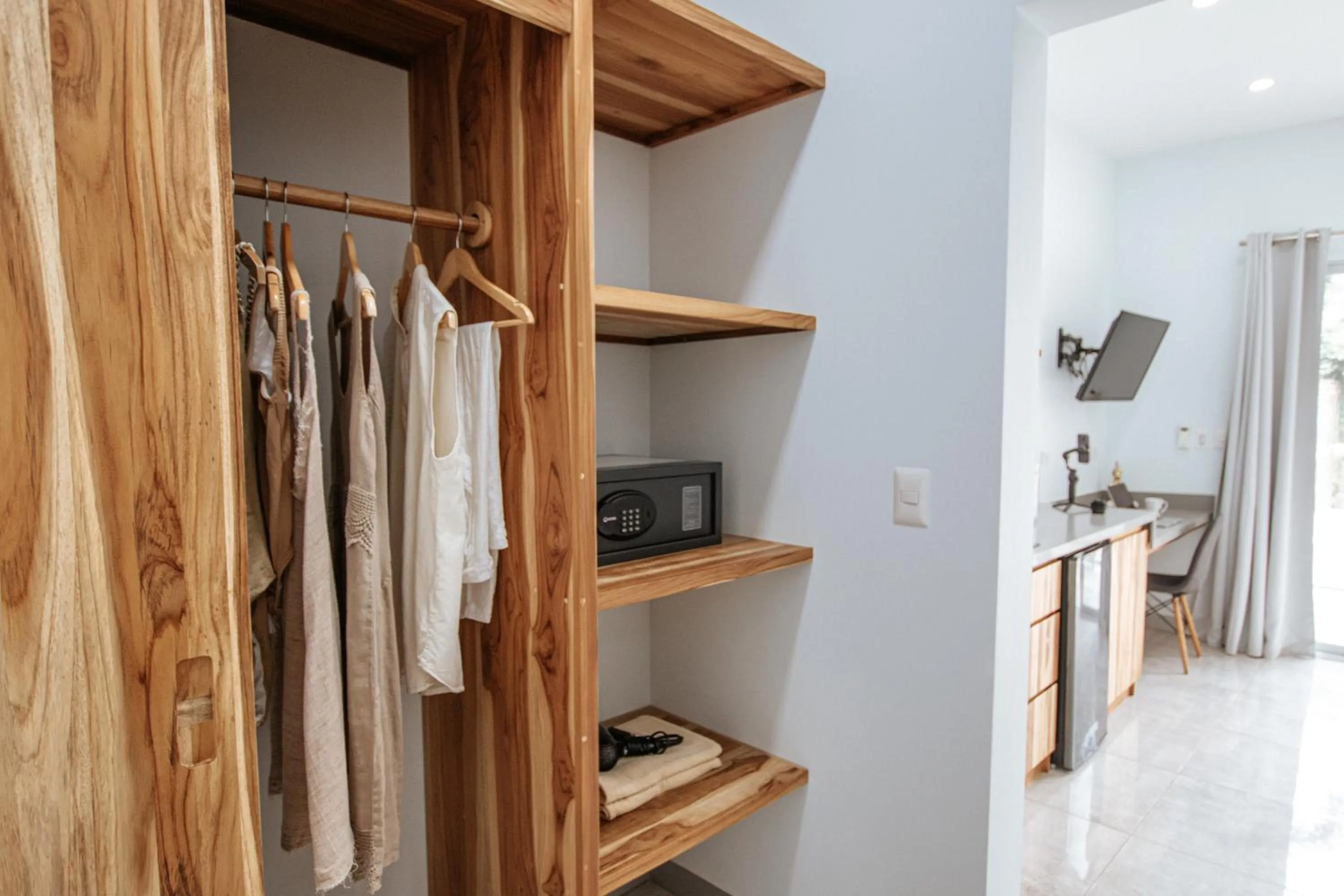 wardrobe in Tamarindo Bay Boutique Hotel, Apartments & Suites
