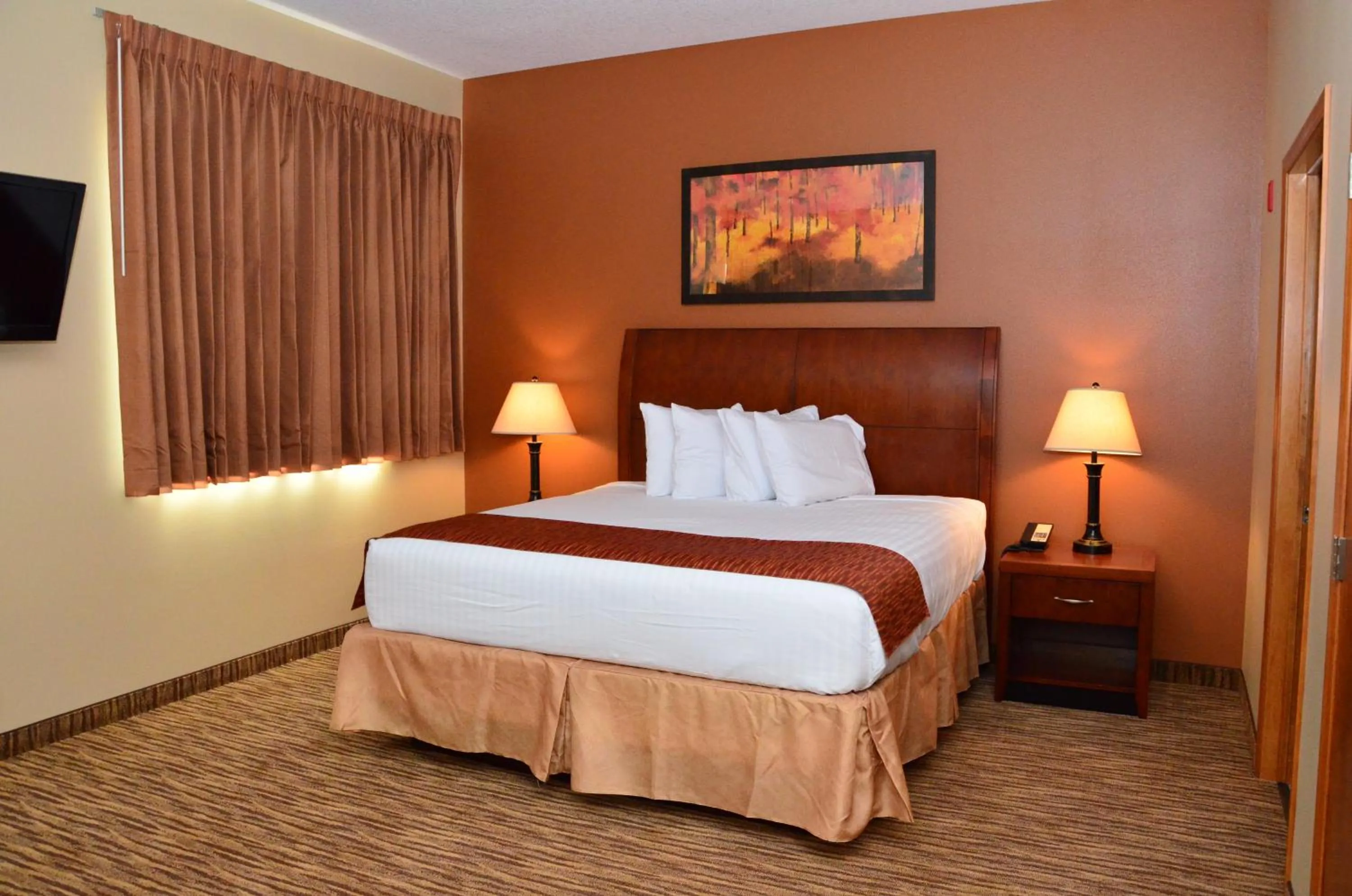 Bed in Cobblestone Inn & Suites - Newton