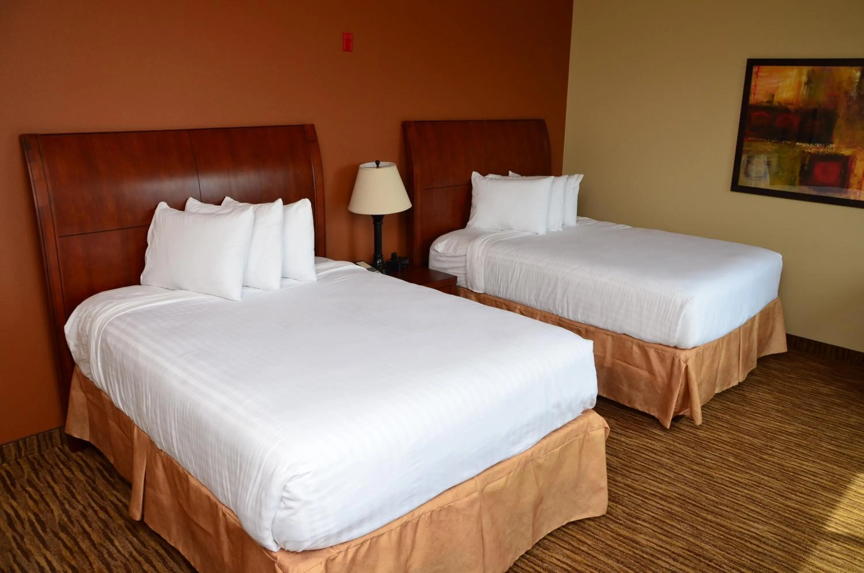 Bed in Cobblestone Inn & Suites - Newton