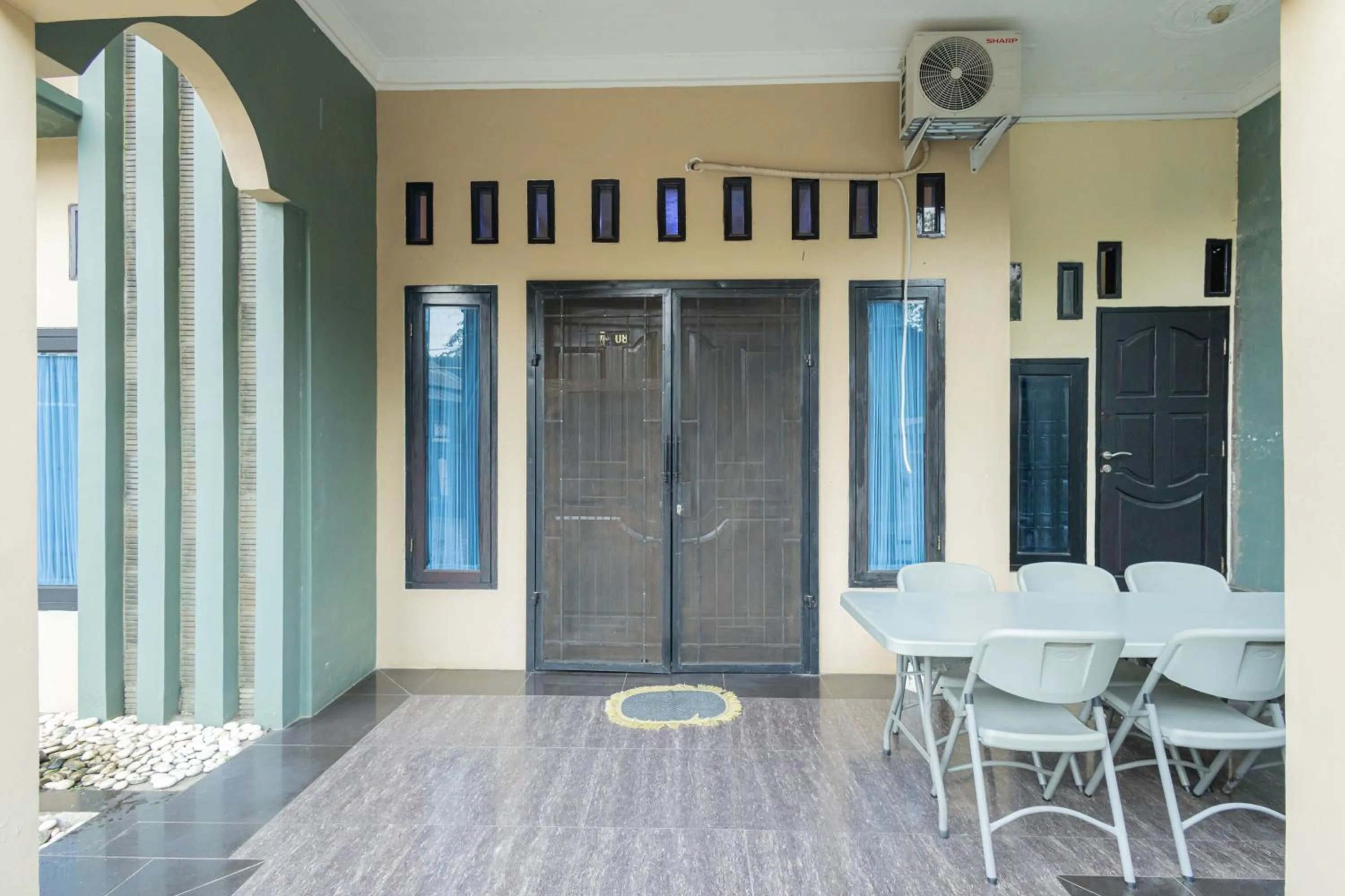 Property building in Boss Residence Serang Mitra RedDoorz