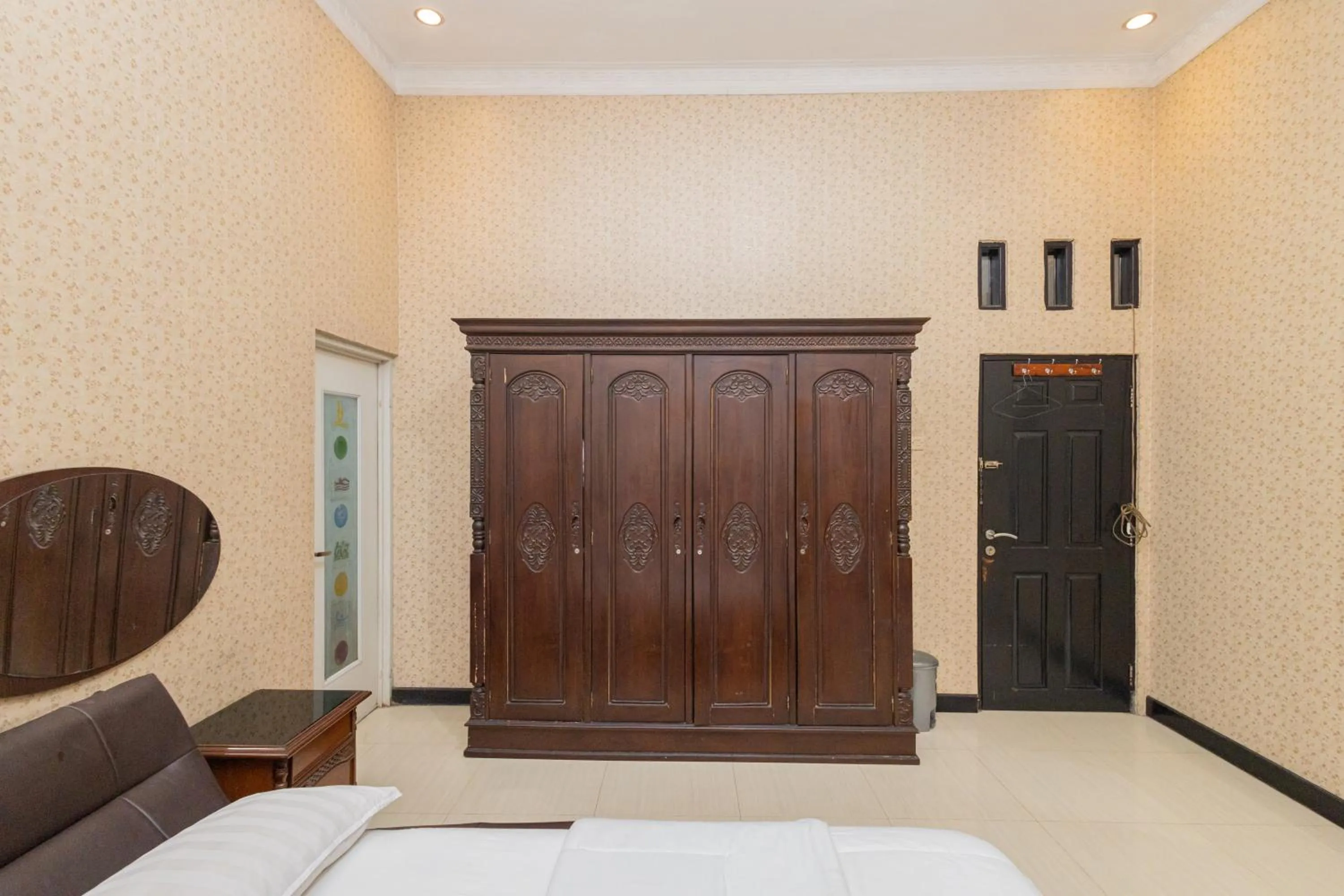 Bed in Boss Residence Serang Mitra RedDoorz