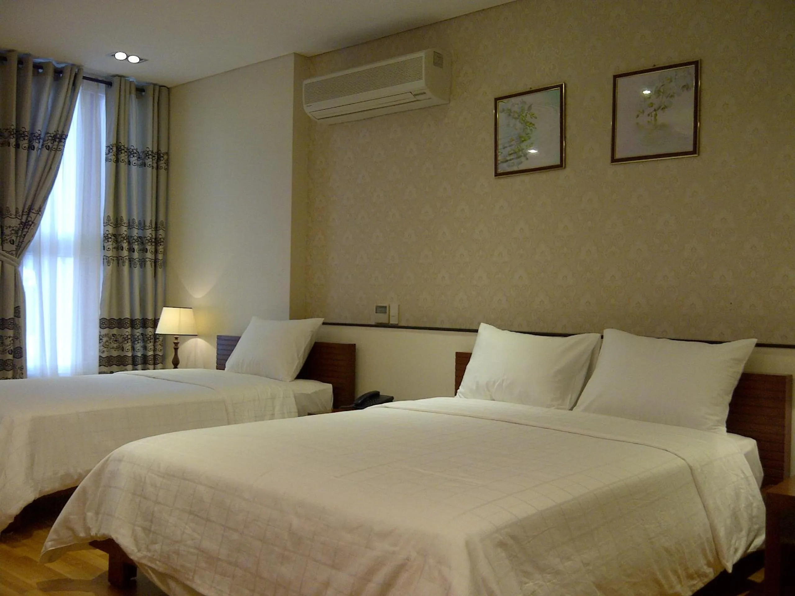 Photo of the whole room, Bed in Anh Dao Mekong Hotel