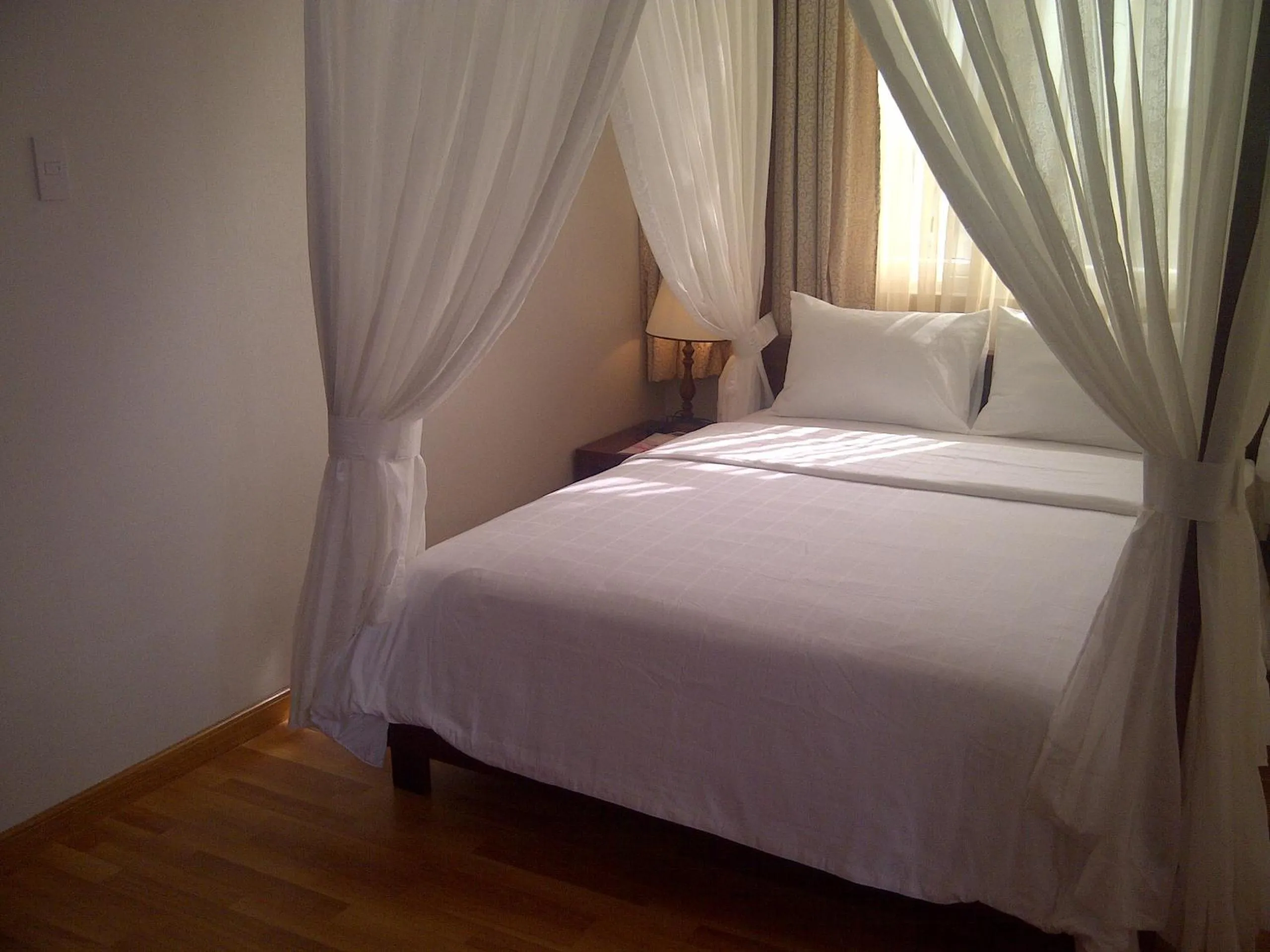 Photo of the whole room, Bed in Anh Dao Mekong Hotel