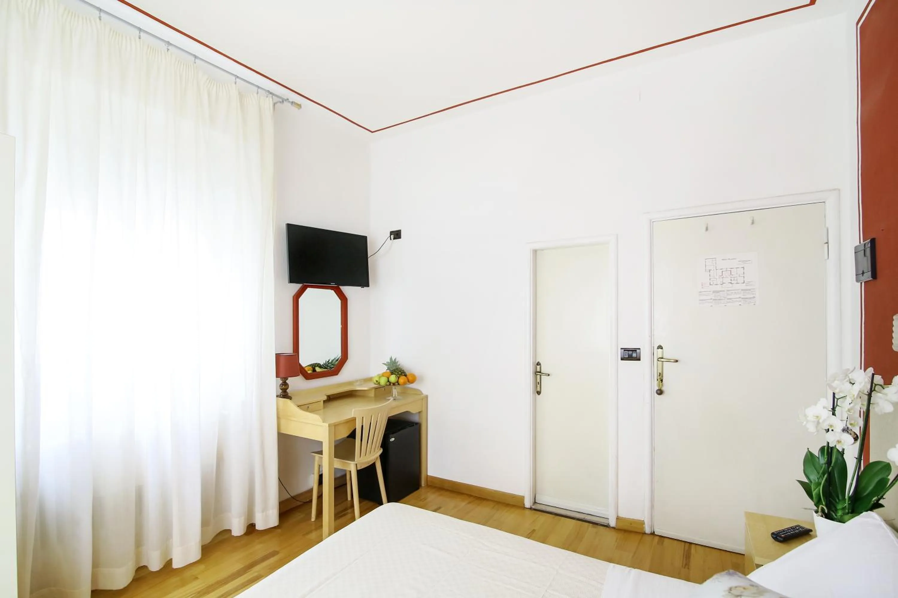 Bed in Hotel Paradiso