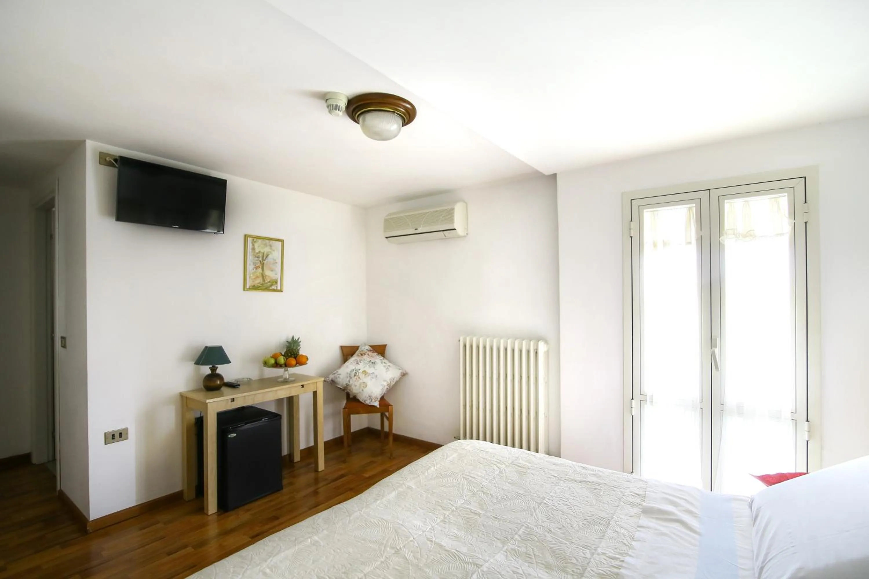 Bed in Hotel Paradiso