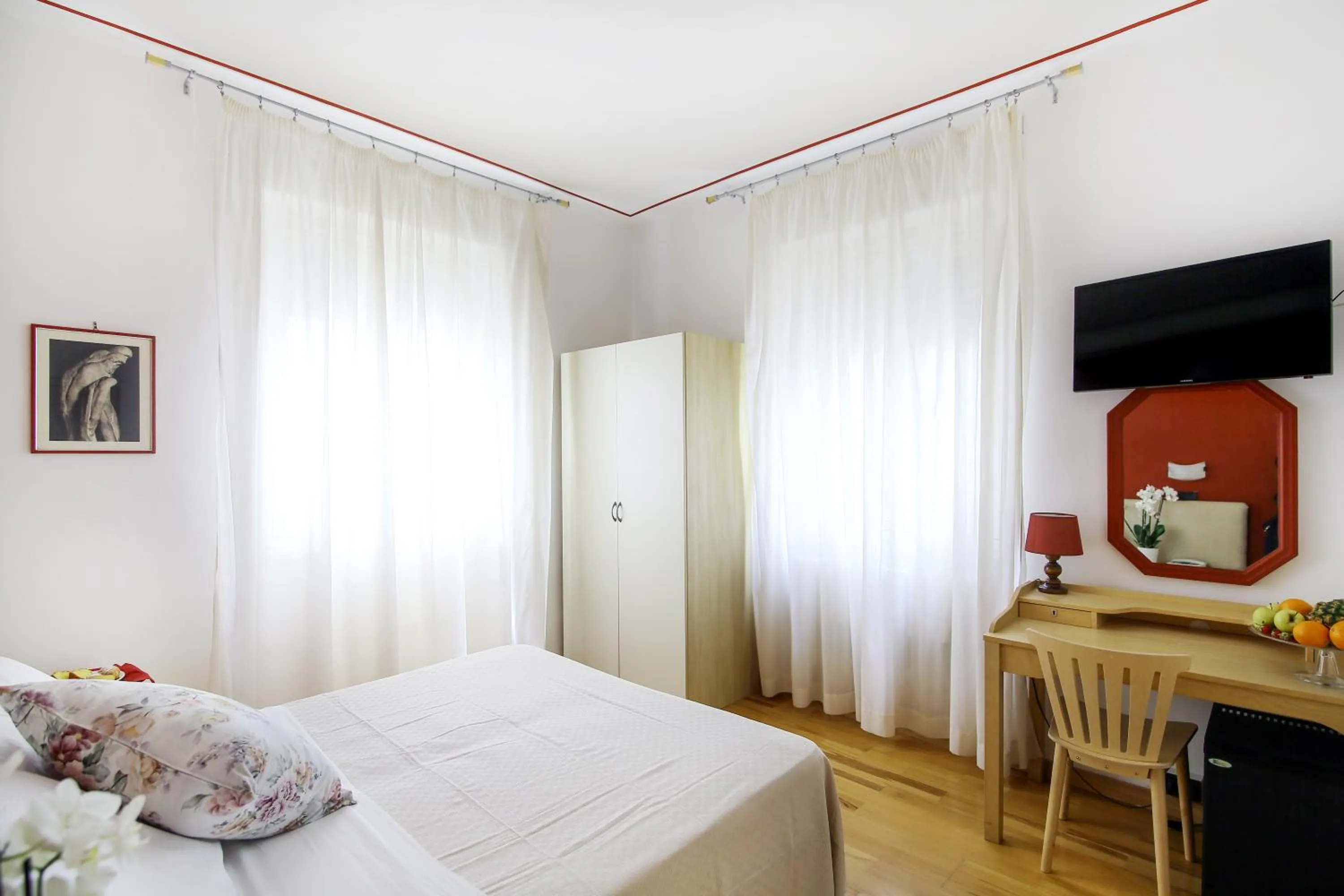 Bed in Hotel Paradiso