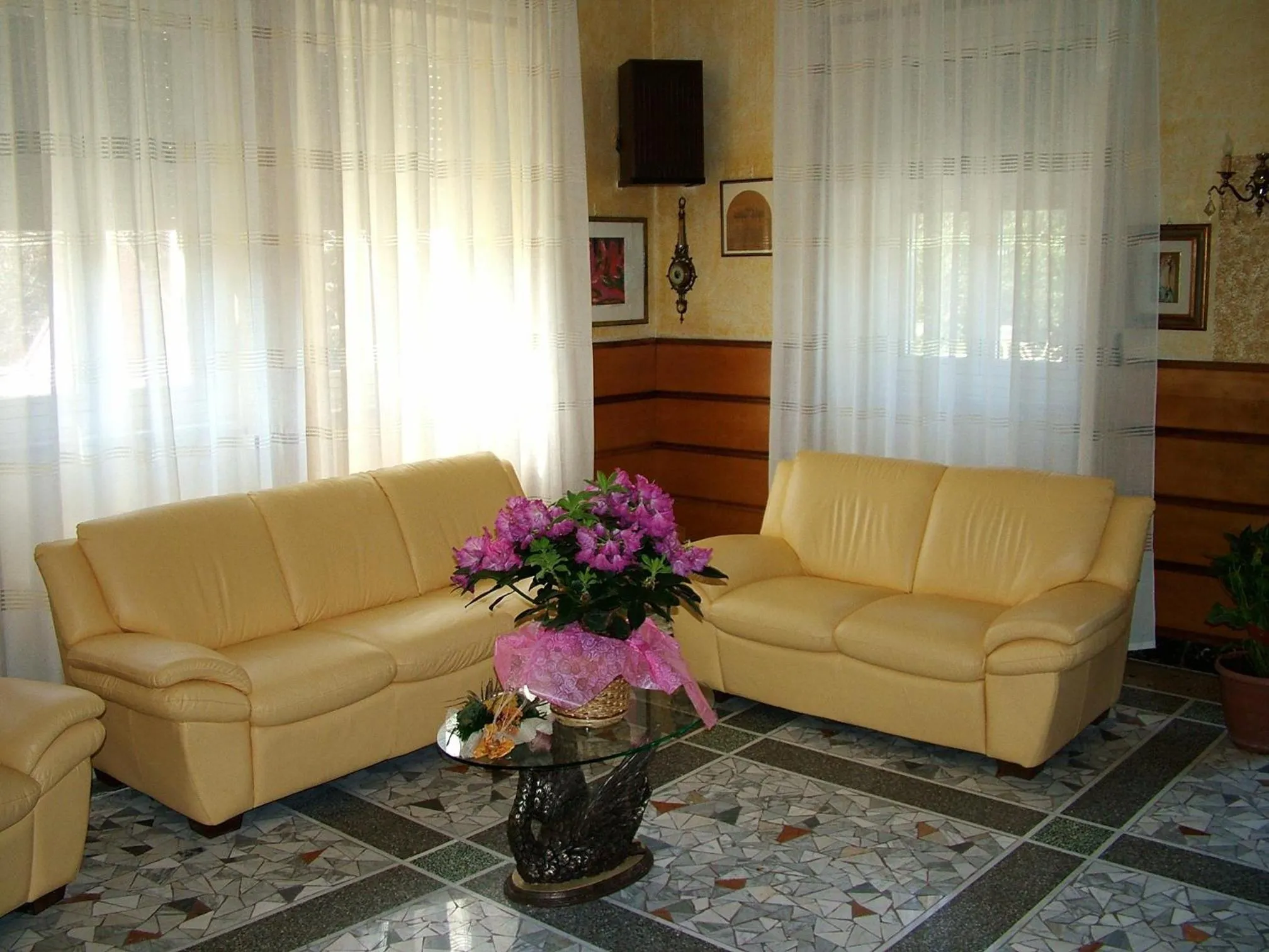 Communal lounge/ TV room in Hotel Paradiso