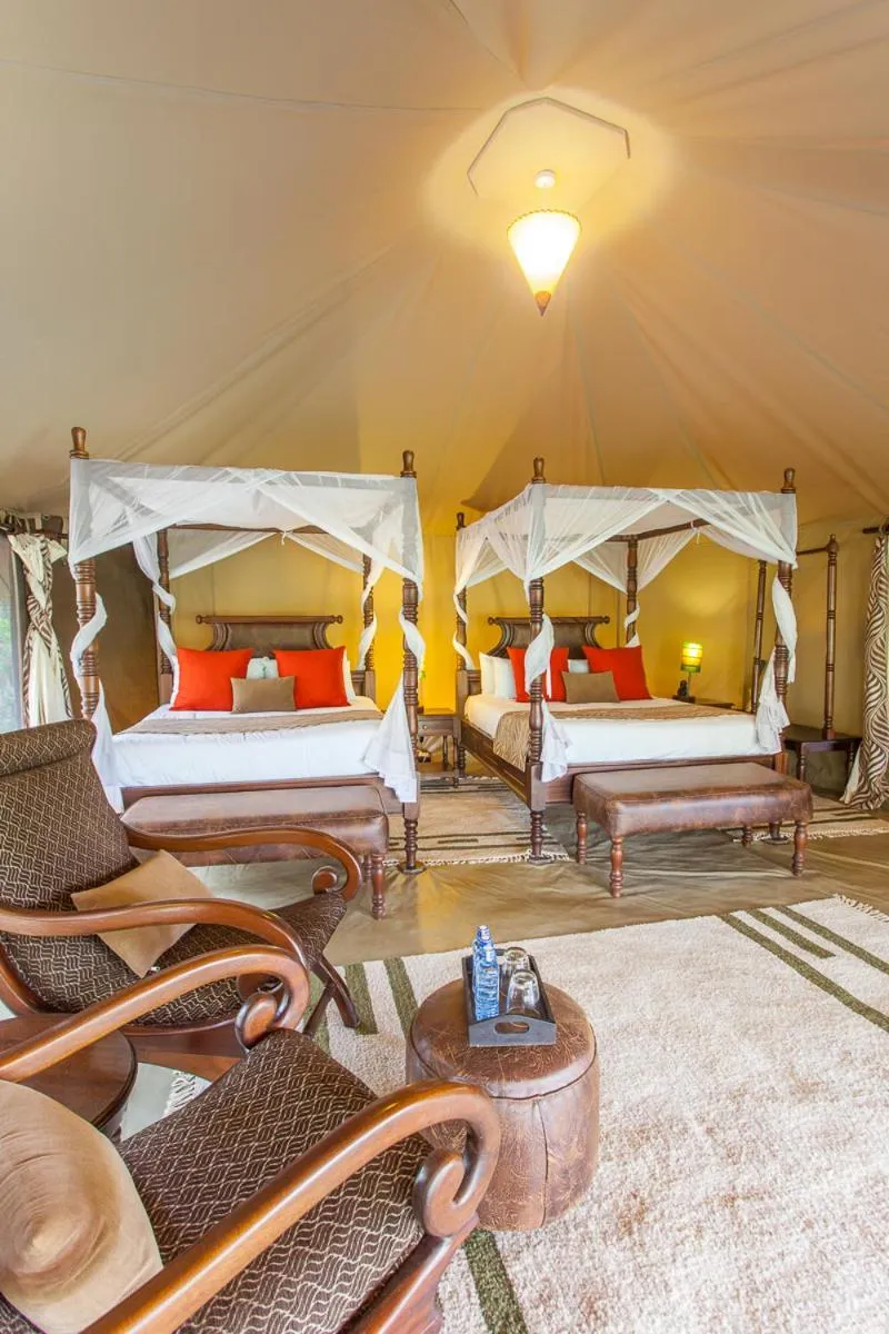 Bed in Mara Ngenche Safari Camp - Maasai Mara National Reserve