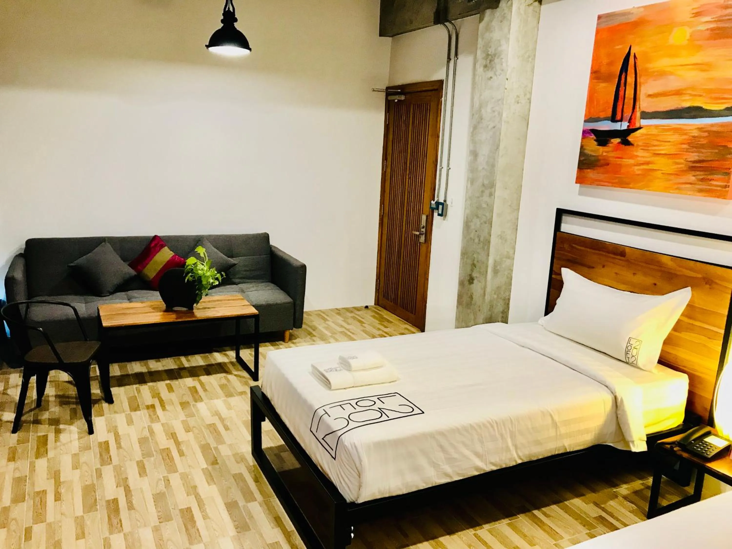 Photo of the whole room, Bed in Loft 202 Hotel