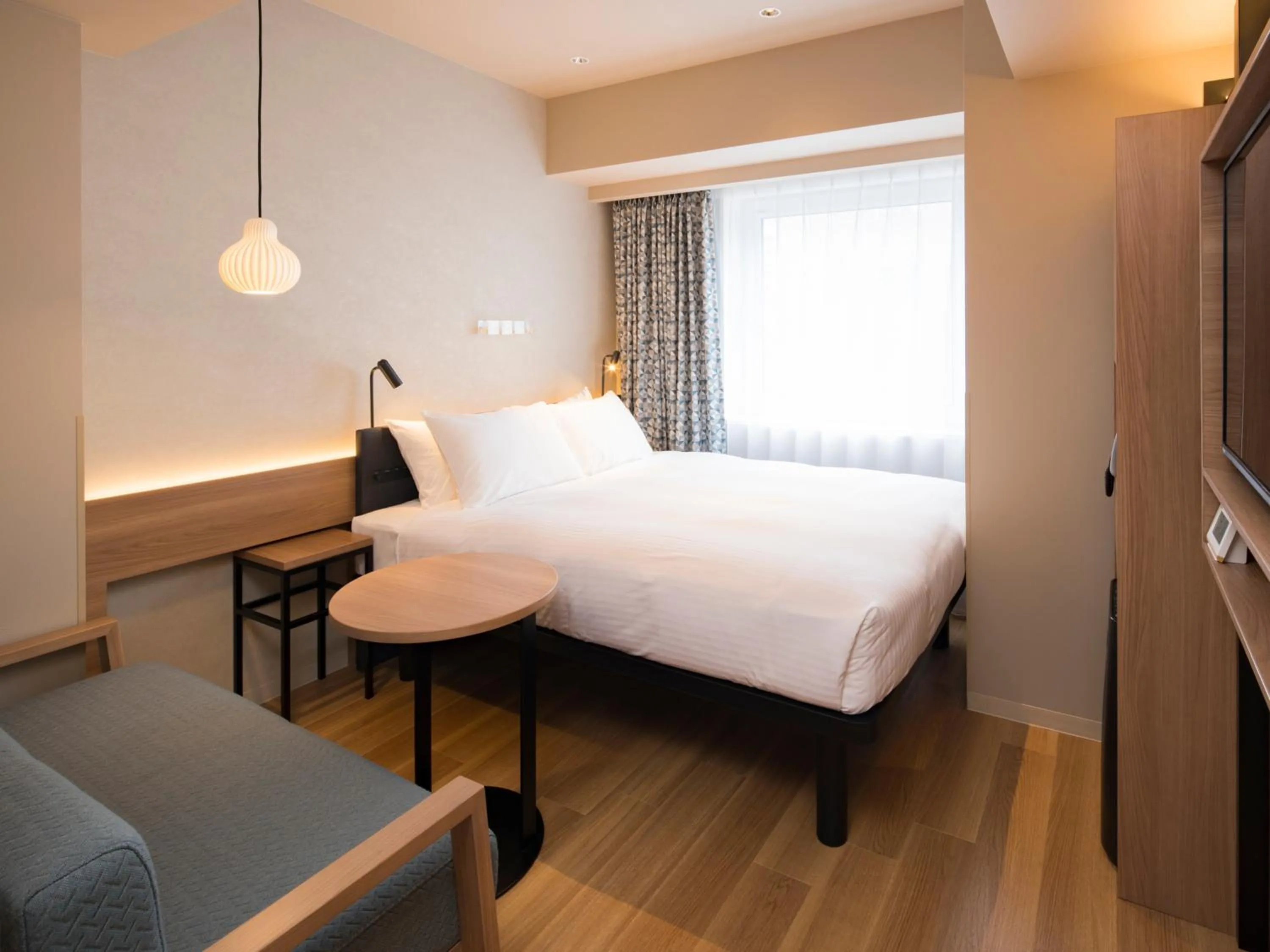 Photo of the whole room, Bed in GRIDS PREMIUM HOTEL OTARU