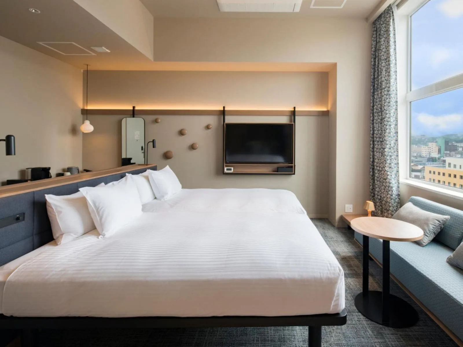 Photo of the whole room, Bed in GRIDS PREMIUM HOTEL OTARU