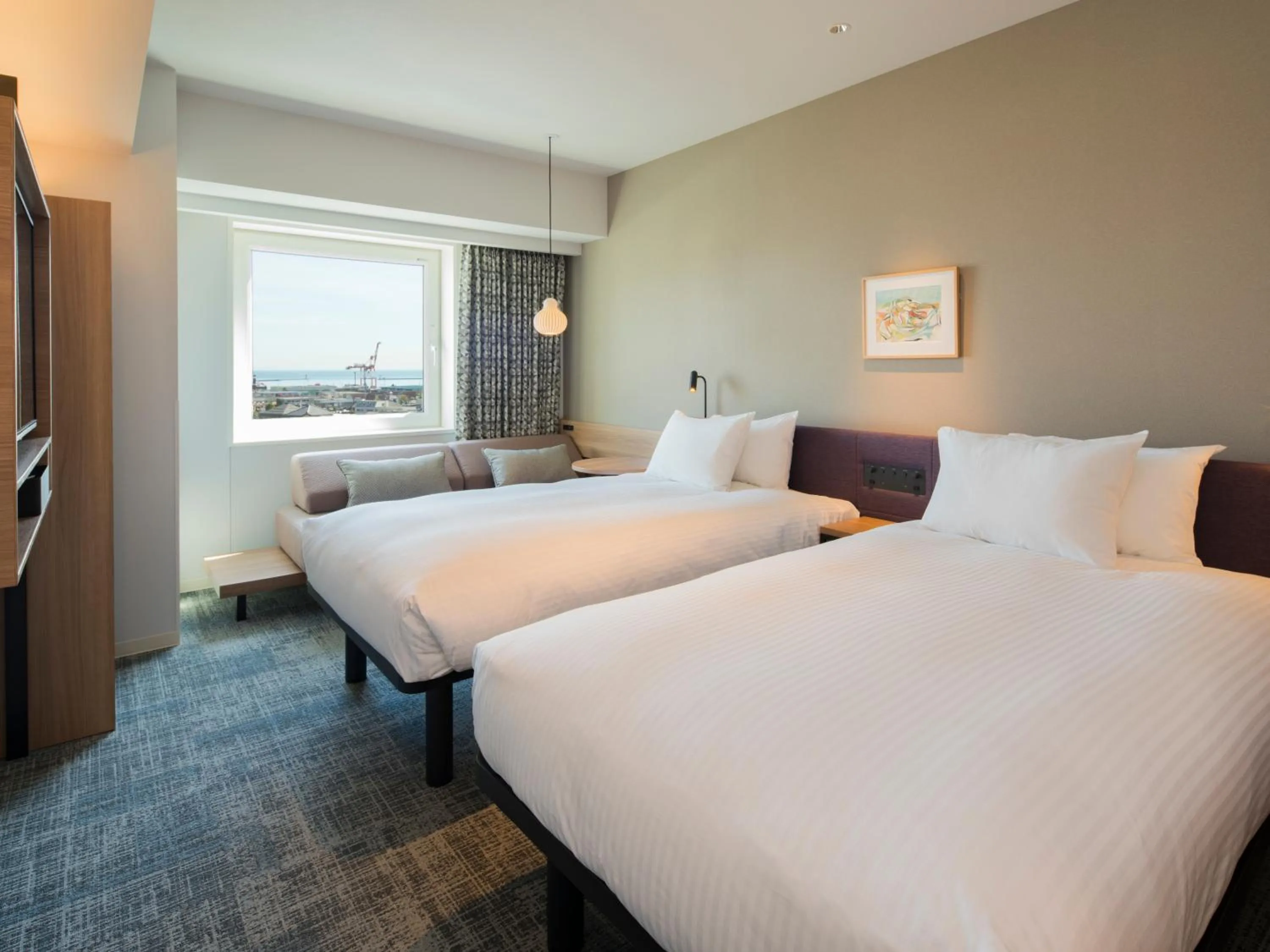 Photo of the whole room, Bed in GRIDS PREMIUM HOTEL OTARU