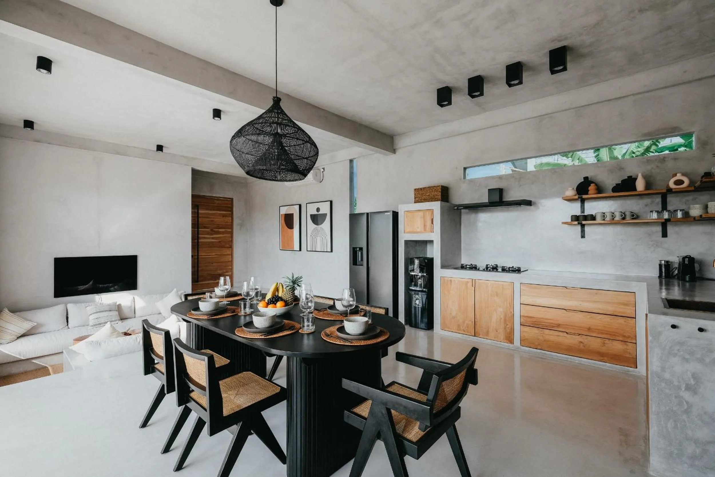 Dining area in Concrete Retreat Villa