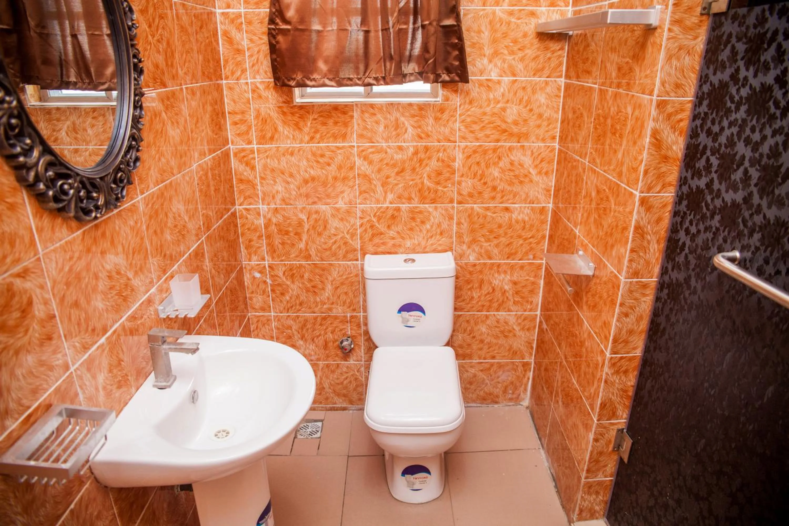 Toilet in Emmy Hotels & Suites