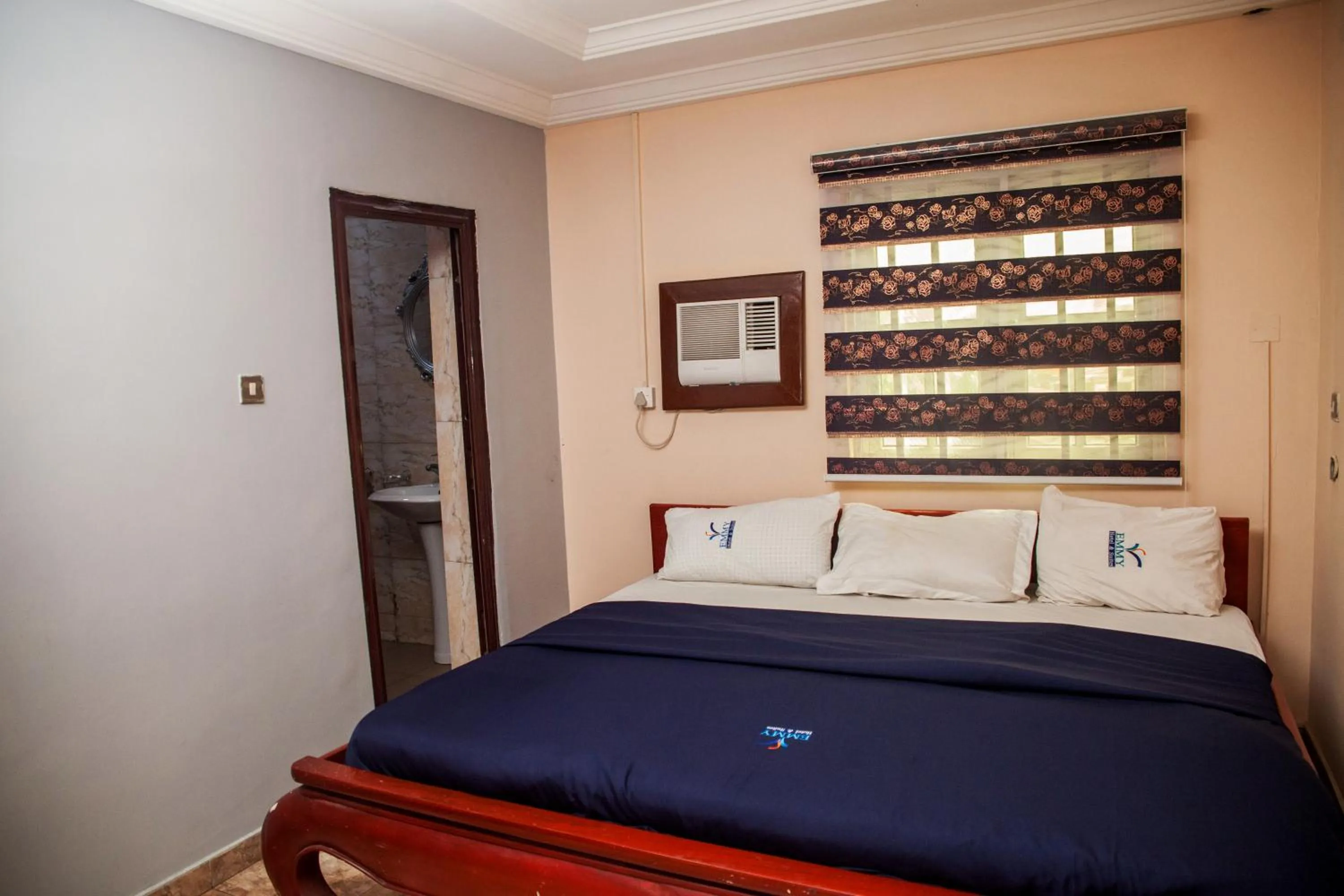 Bed in Emmy Hotels & Suites