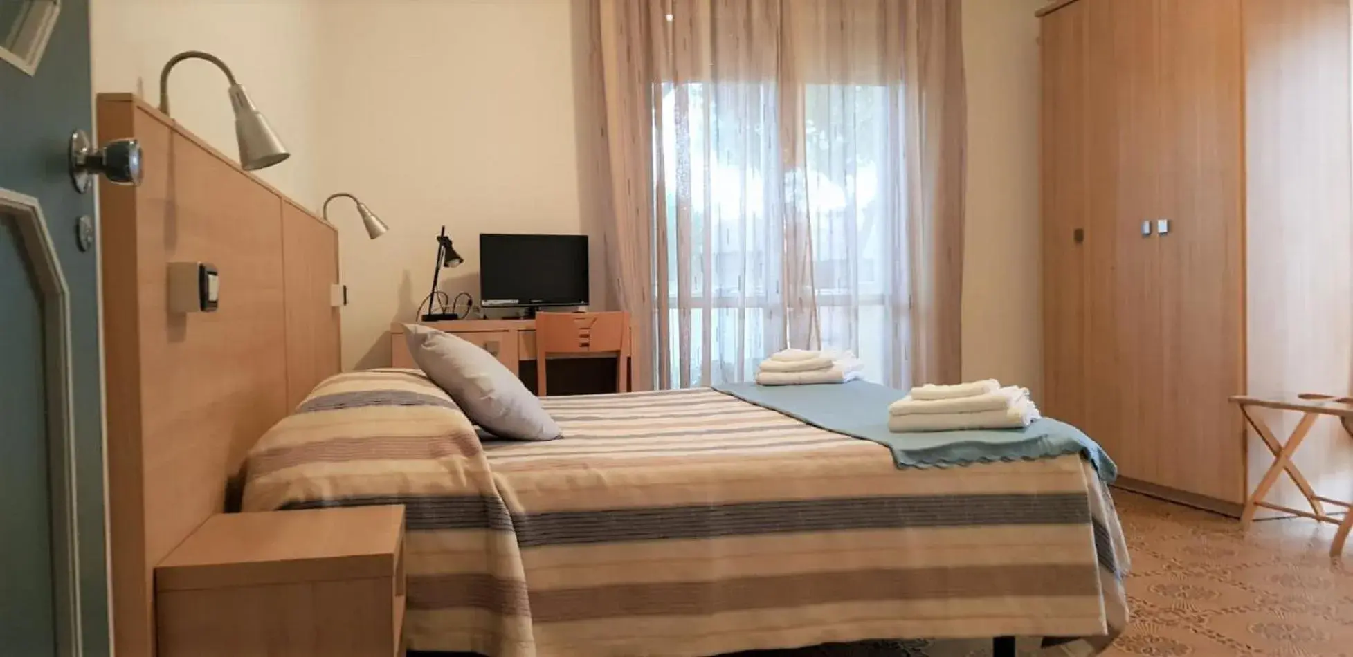 Classic Quadruple Room in Hotel Enrica Classic Quadruple Room in Hotel Enrica