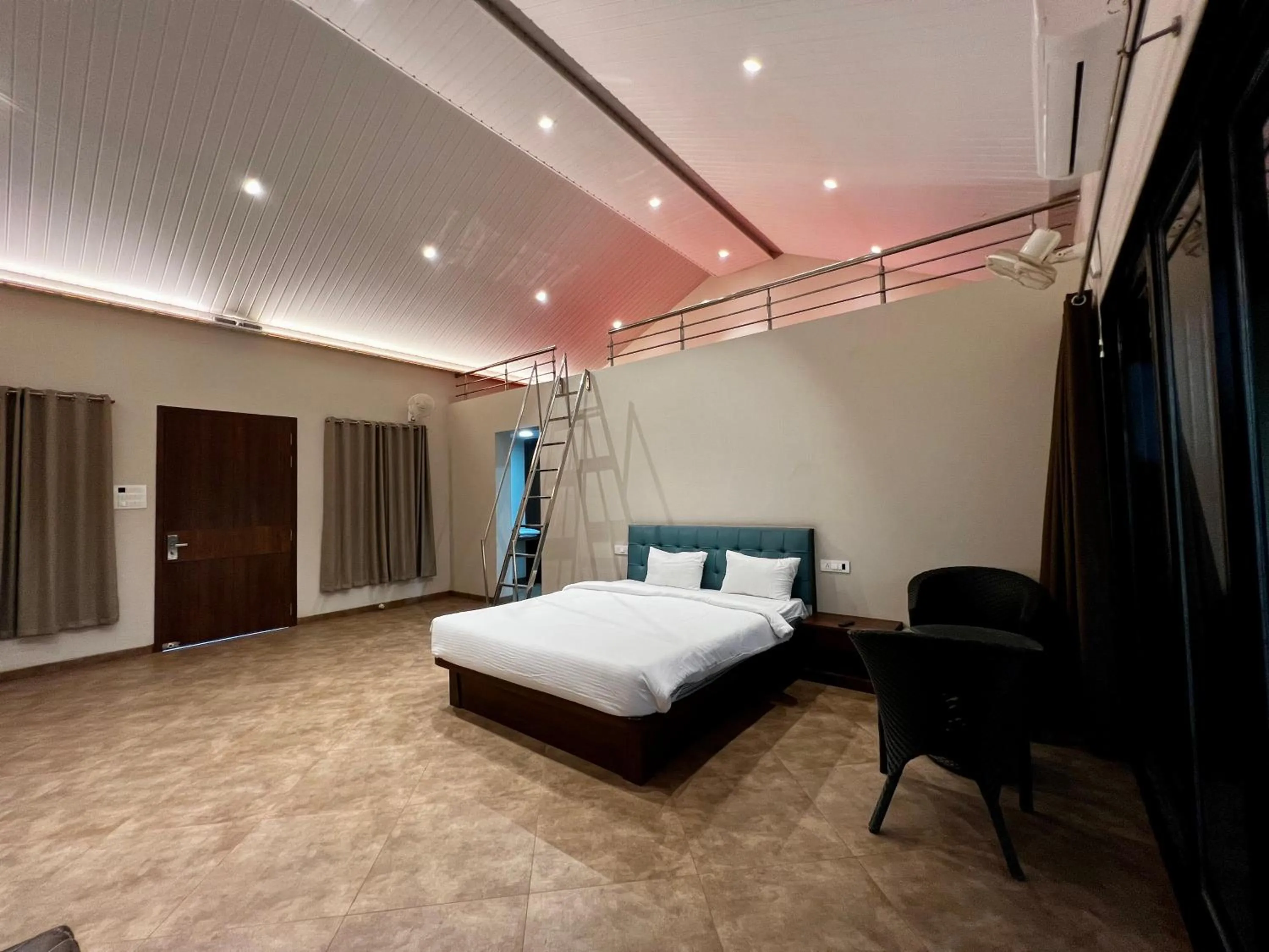 Bed in Paramount Riverfront Resort & Spa, Karjat
