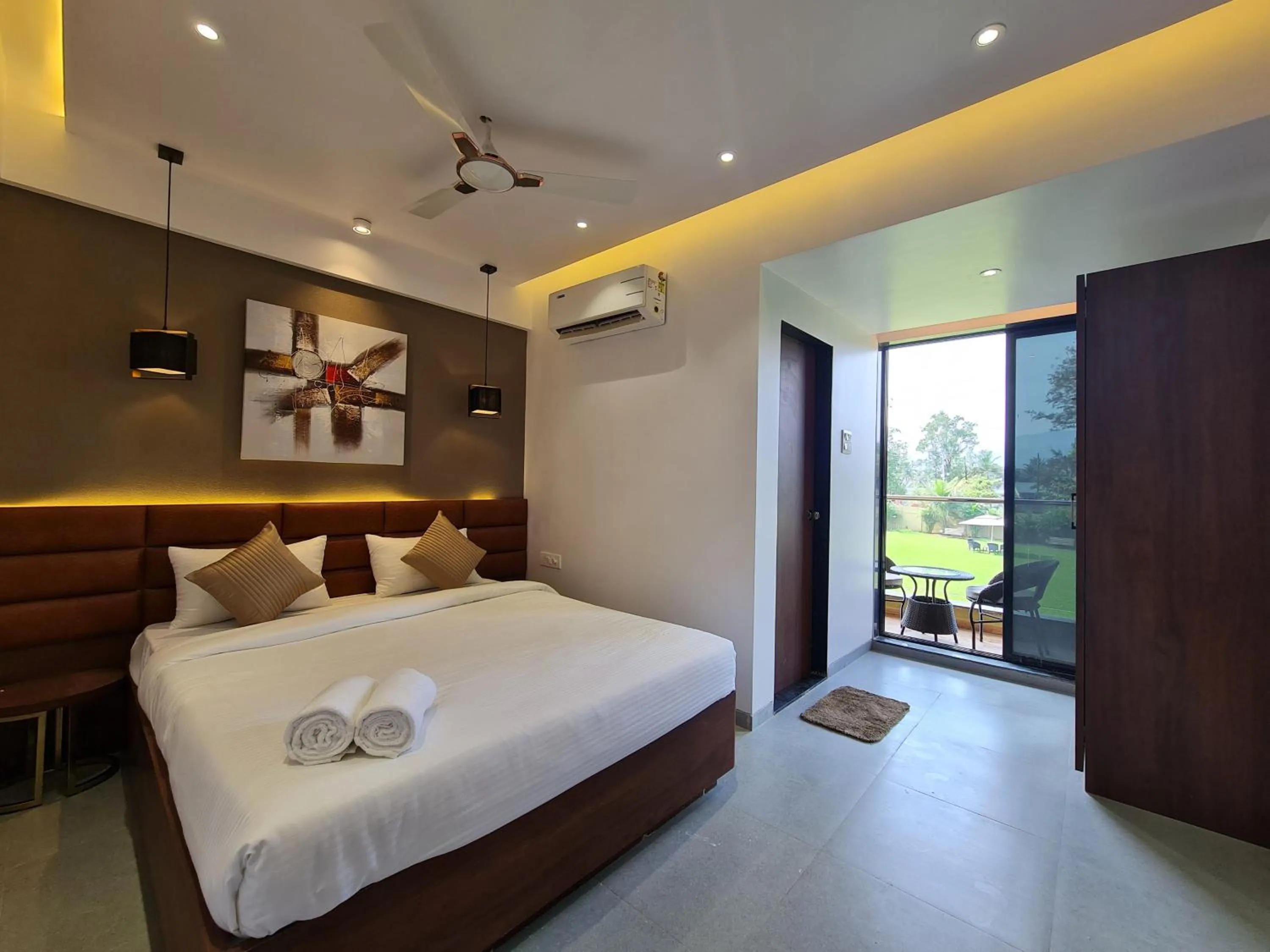 Bed in Paramount Riverfront Resort & Spa, Karjat