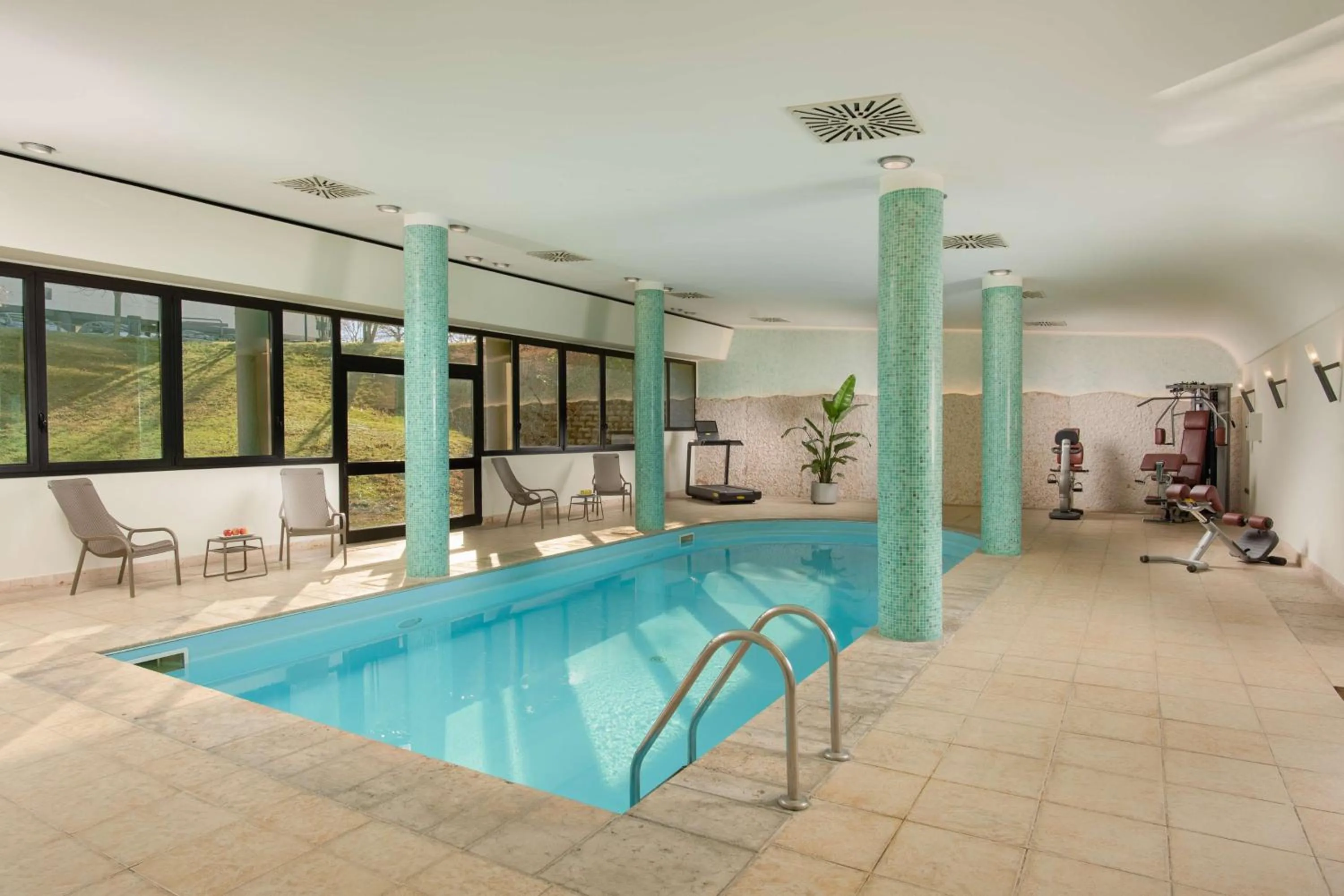 Pool view in NH Bologna Villanova