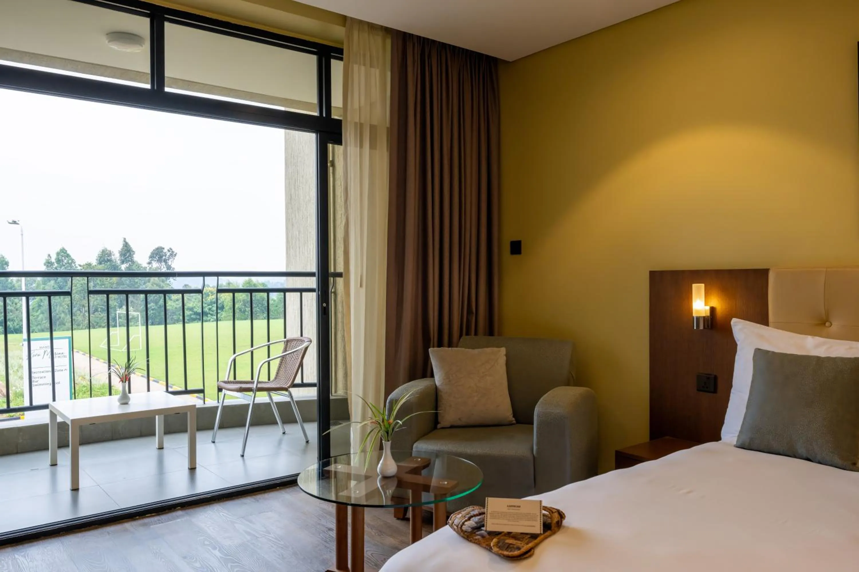 View (from property/room), Bed in Mantis Kivu Marina Bay Hotel