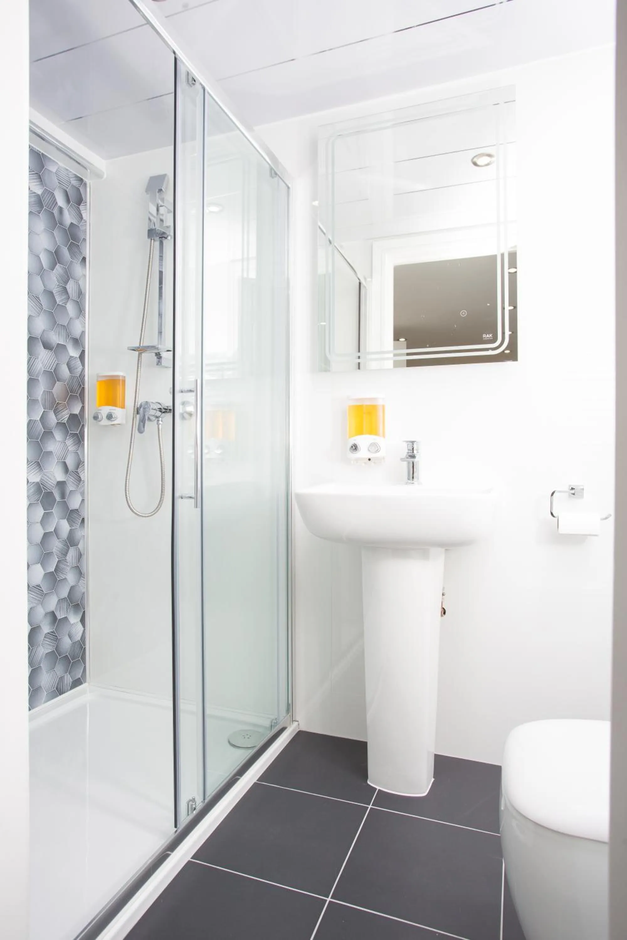 Shower in Legoland Heathrow Windsor Apartment Hotel