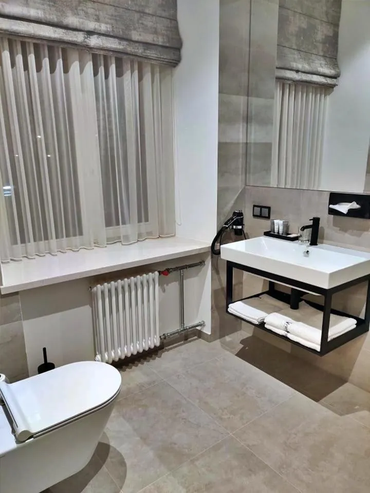 Bathroom in Vvinn Hotel