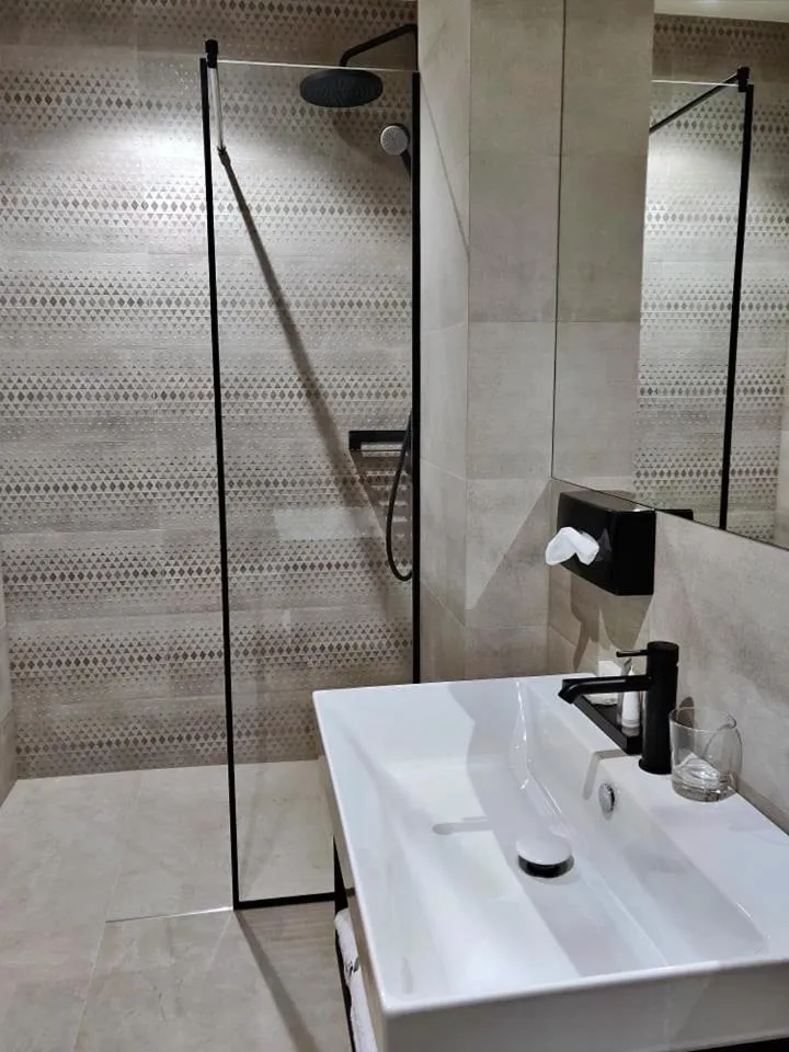 Bathroom in Vvinn Hotel