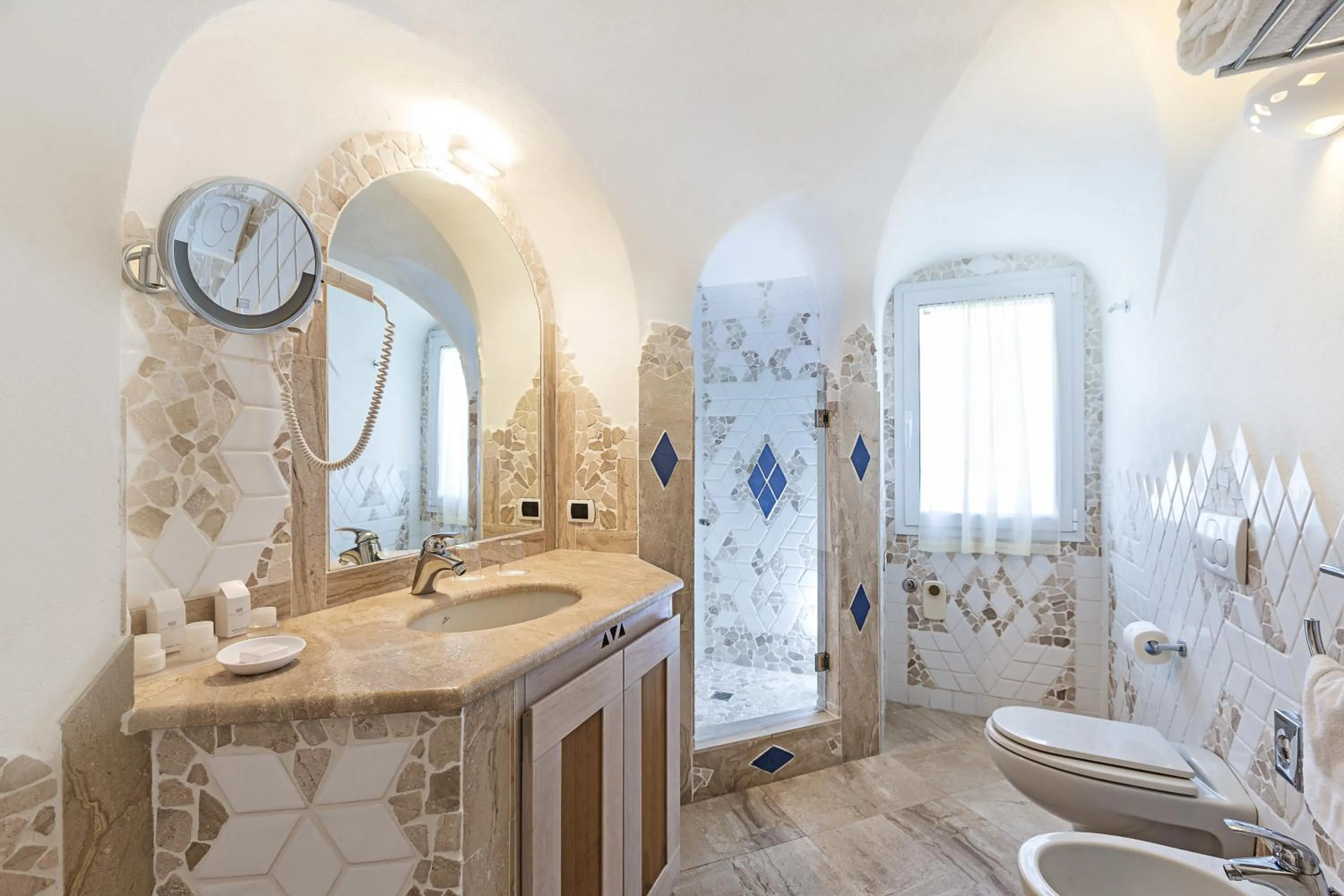 Day in Grand Hotel Poltu Quatu