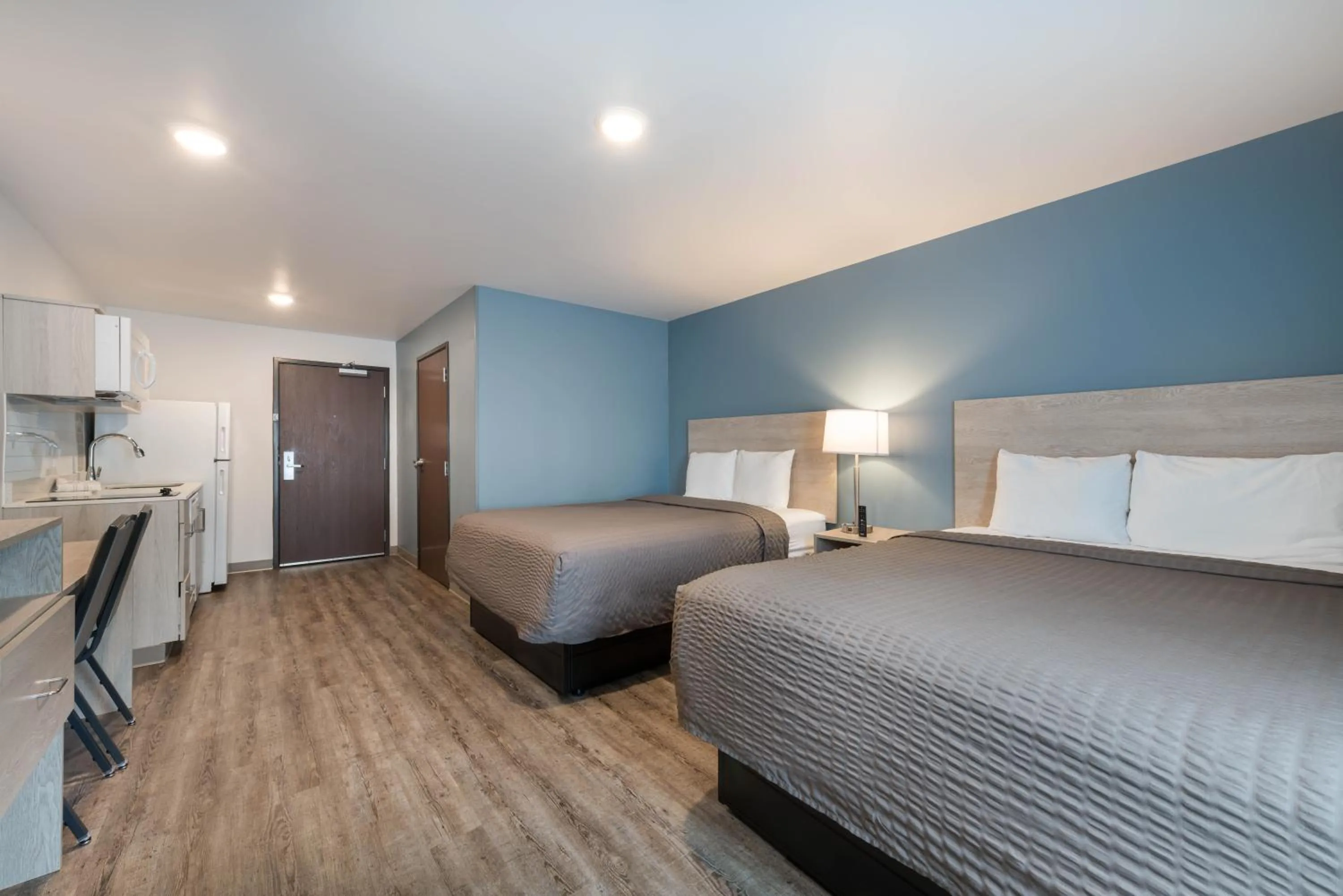 Photo of the whole room, Bed in WoodSpring Suites Concord-Charlotte Speedway