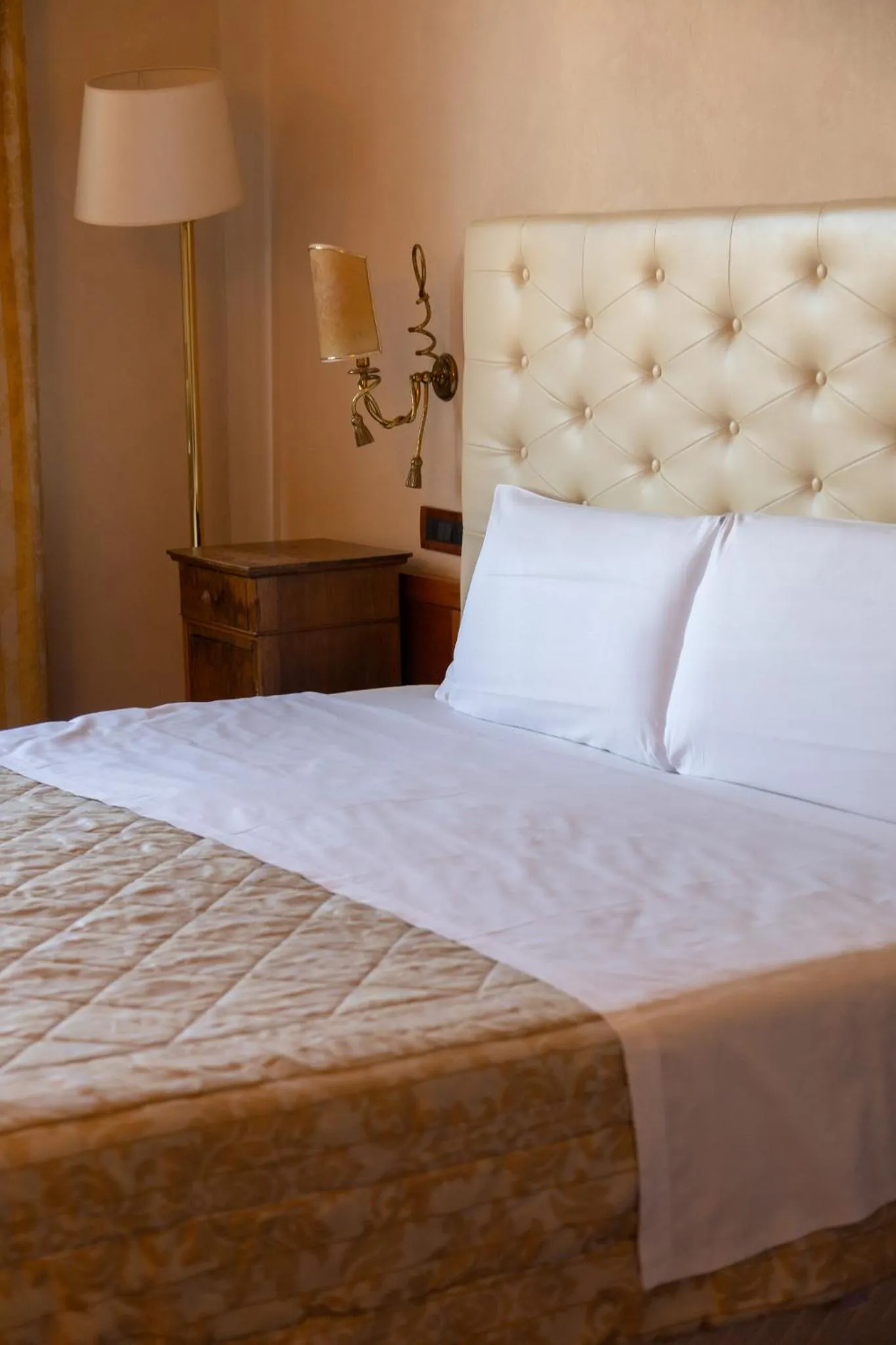 Bed in Hotel Continental