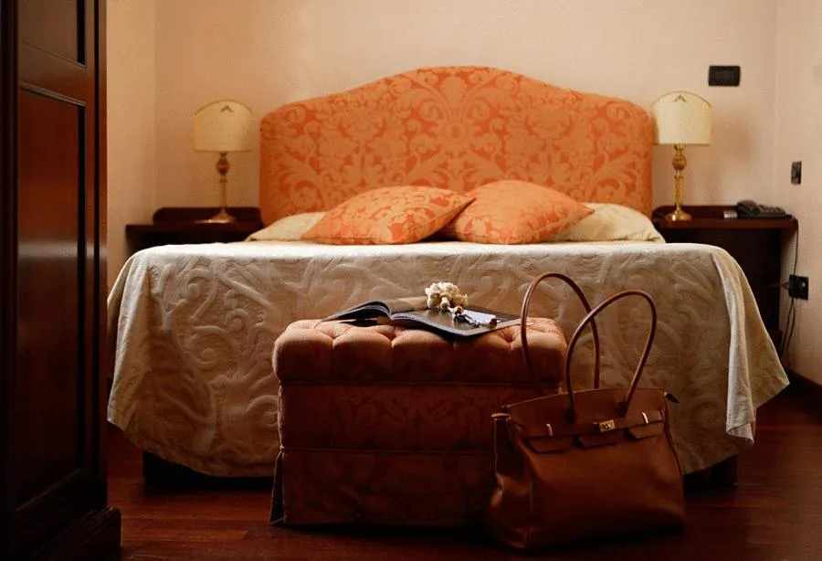 Photo of the whole room, Bed in La Rosa dei Venti