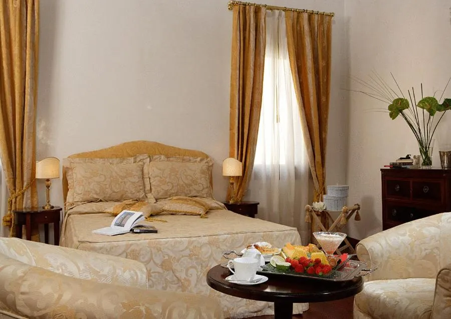 Photo of the whole room, Bed in La Rosa dei Venti