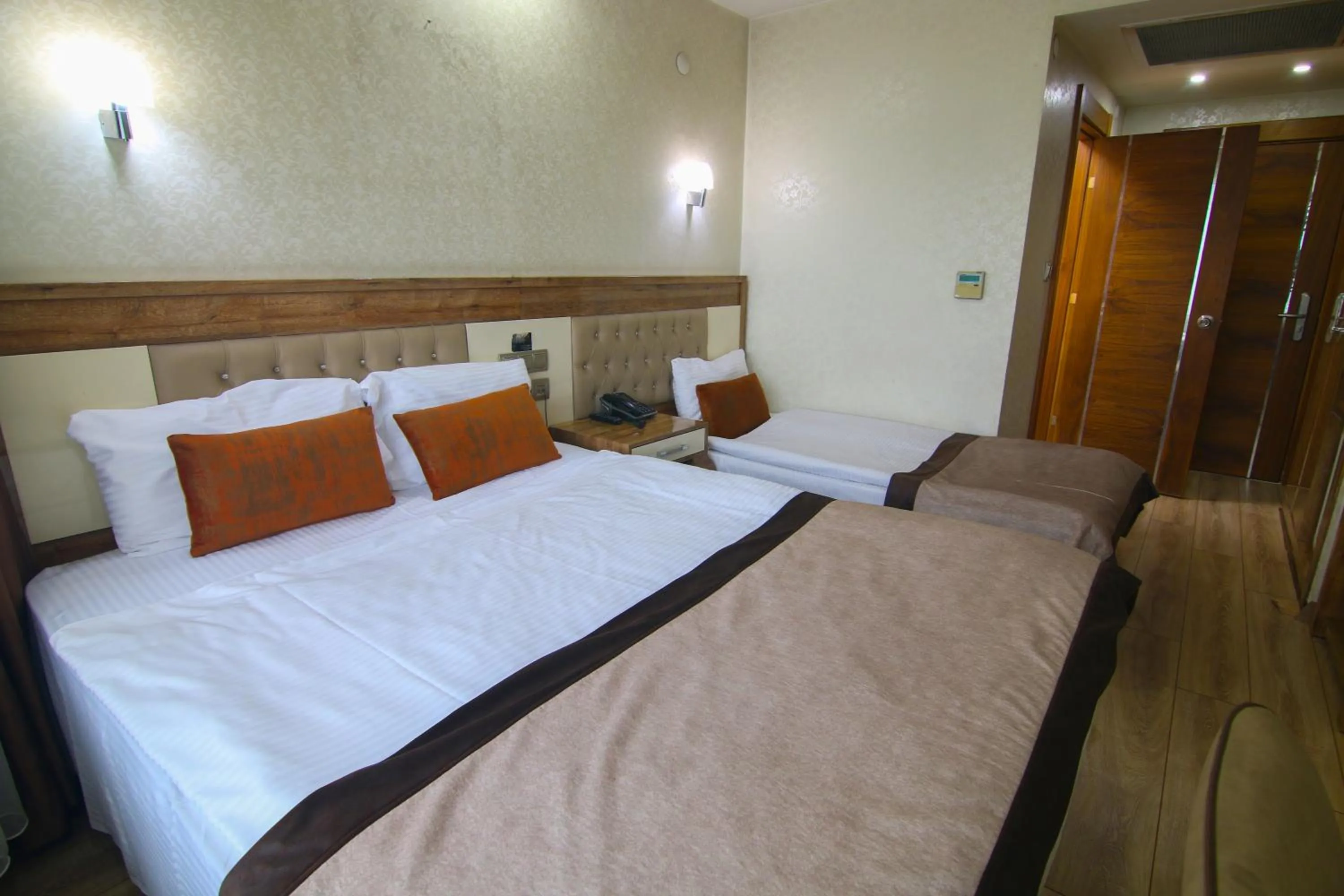 Bed in Grand Zara Hotel