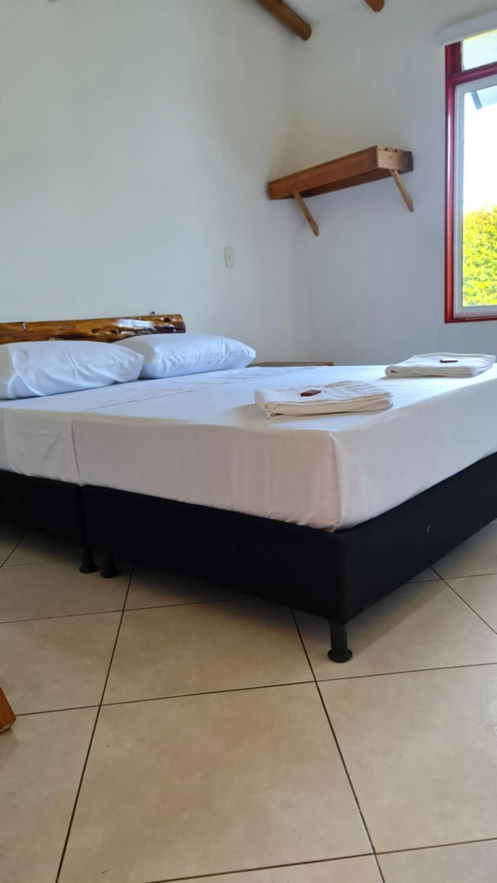 Bed in HOSTERÍA BRISAS DEL RÍO