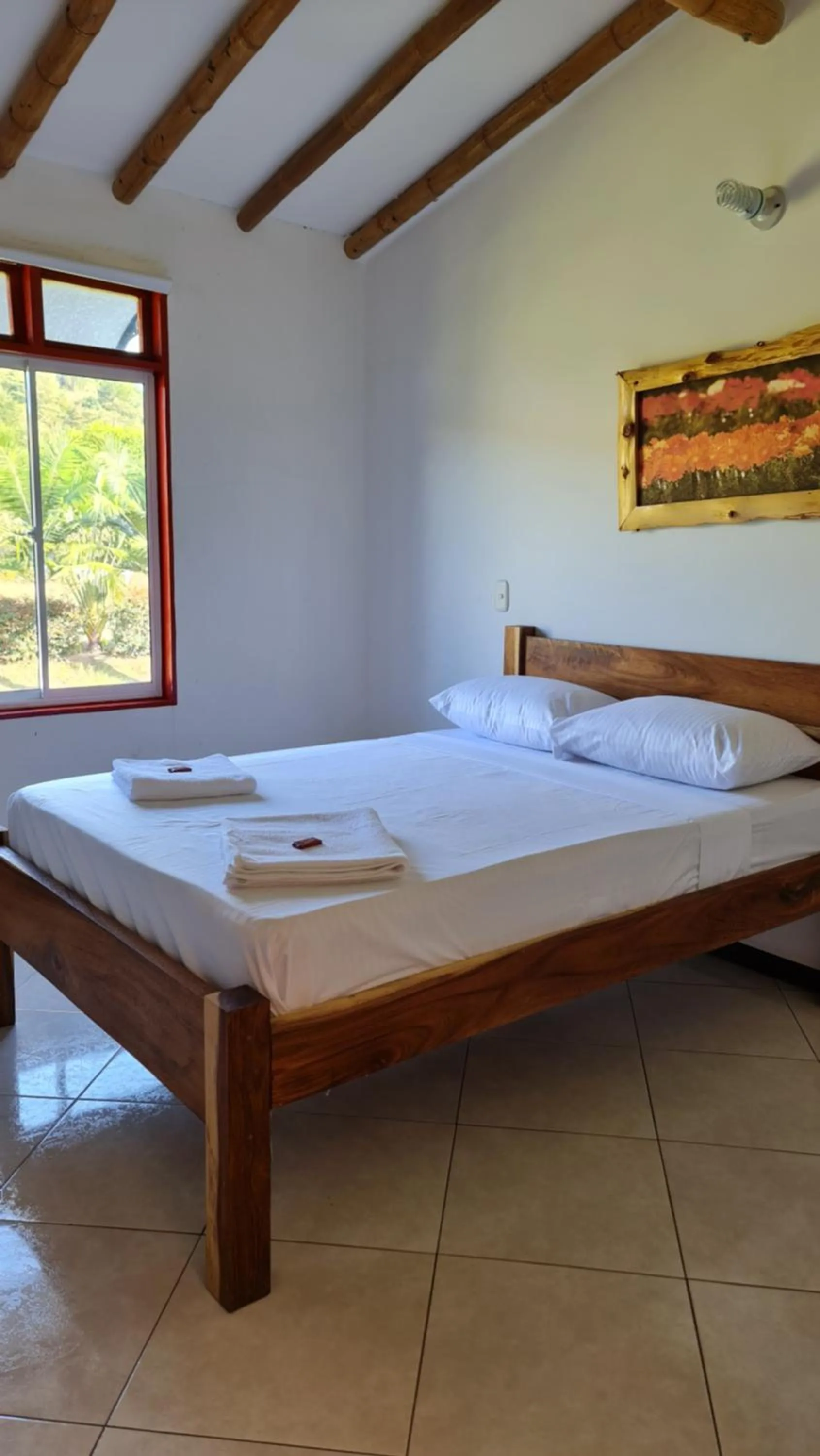 Bed in HOSTERÍA BRISAS DEL RÍO