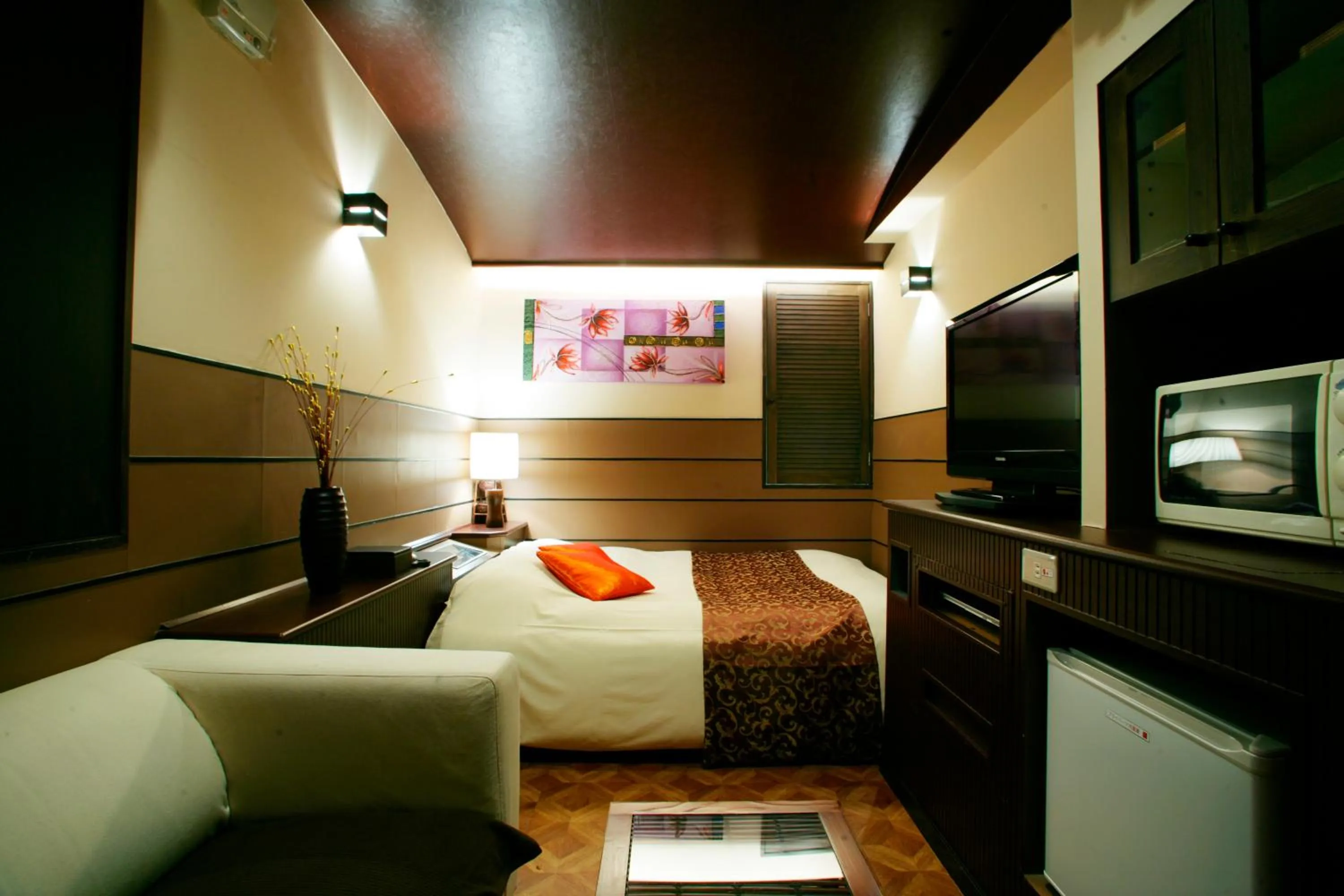 Bed in HOTEL CHECK INN BALI adult only