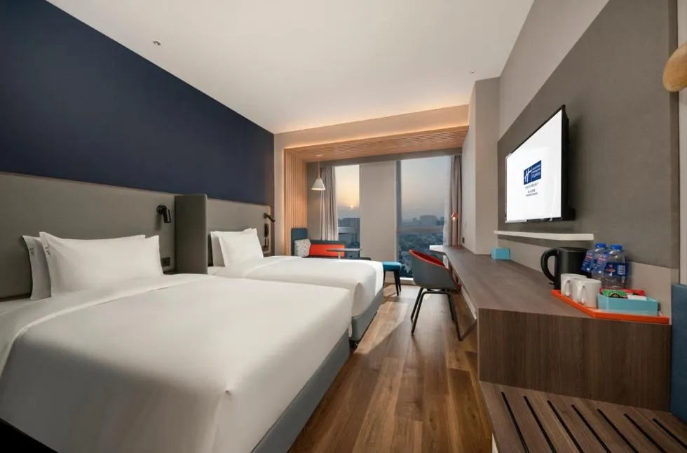 Bed in Holiday Inn Express Meishan Dongpo by IHG