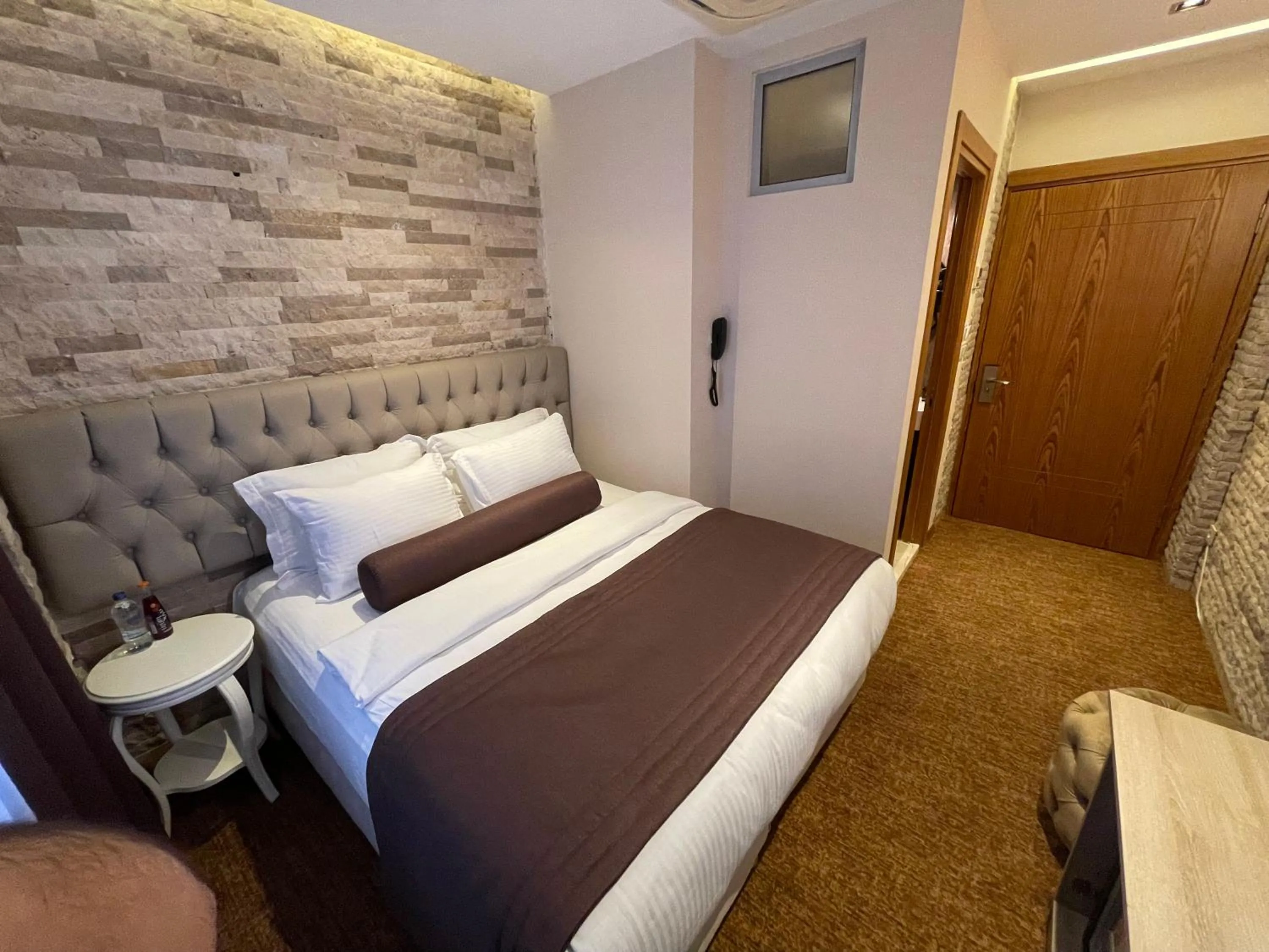 Bed in Mayfair Seaside Hotel