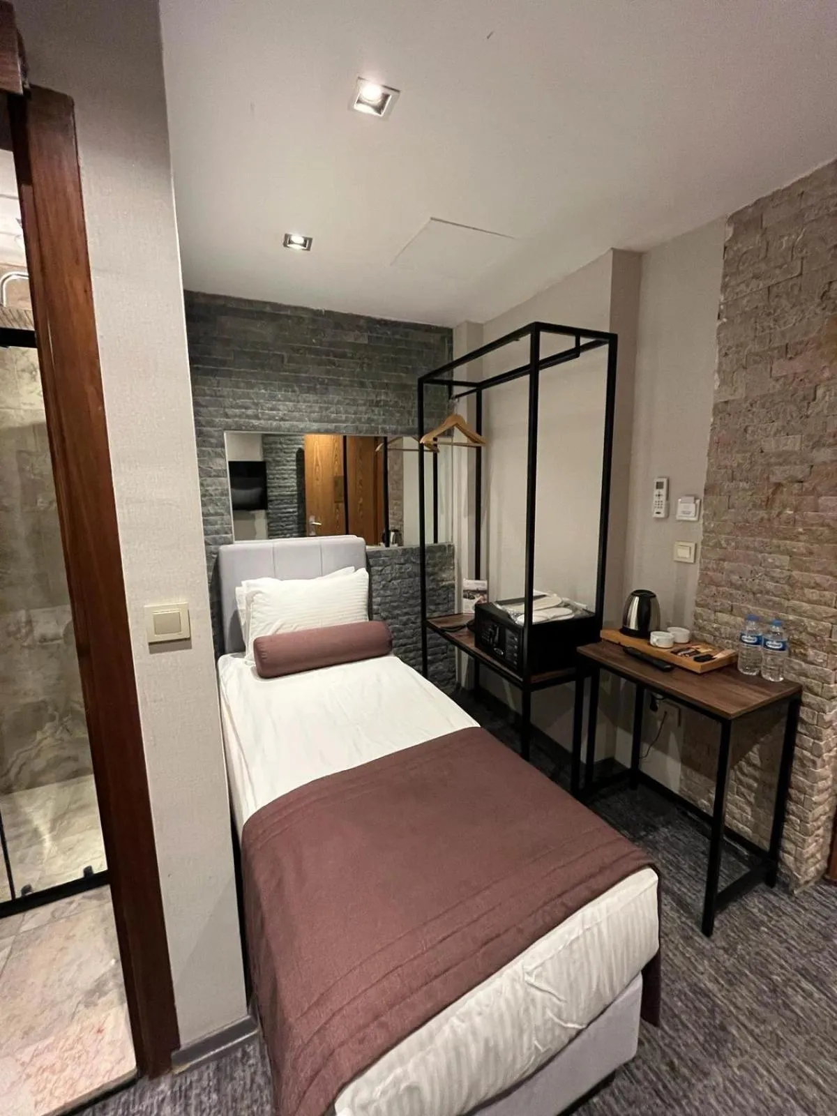 Bed in Mayfair Seaside Hotel